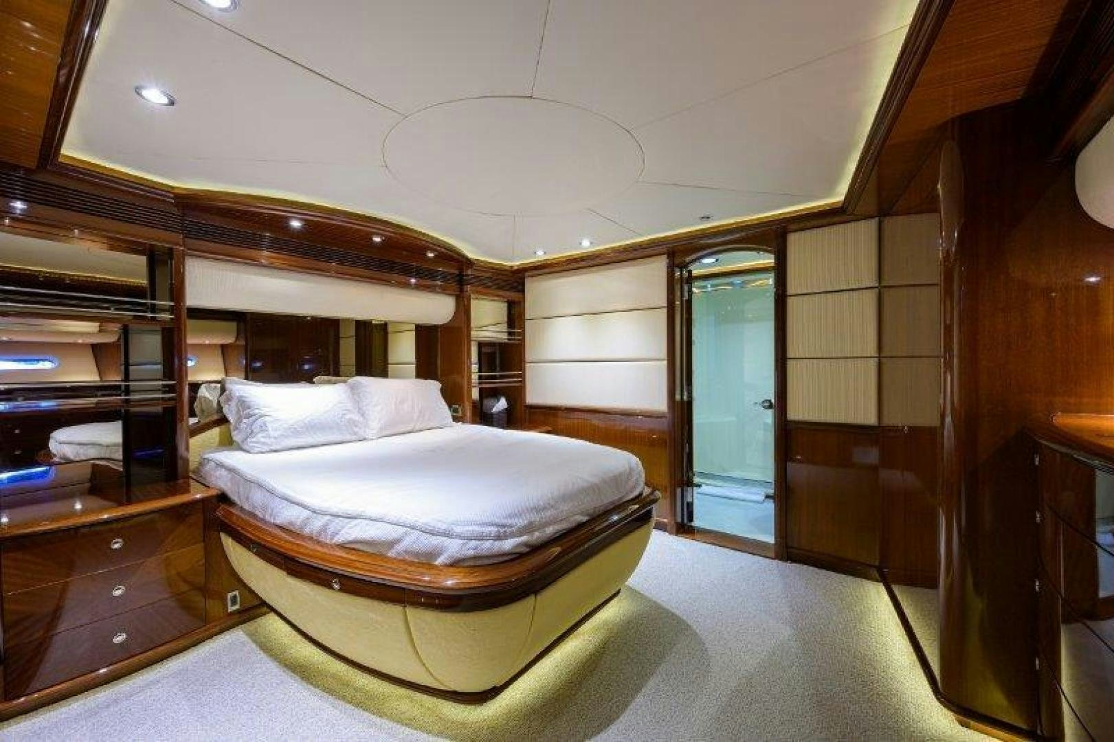 a large bedroom with a large bed aboard VIRGINIA SEA Yacht for Sale