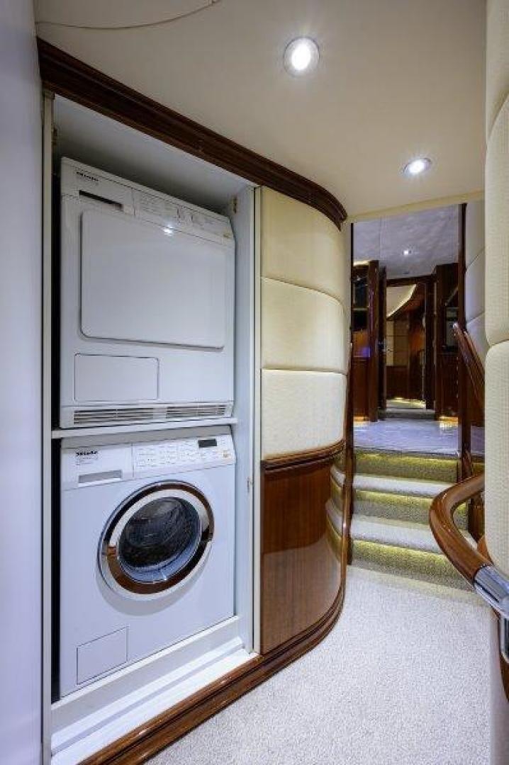 a washing machine in a room aboard VIRGINIA SEA Yacht for Sale