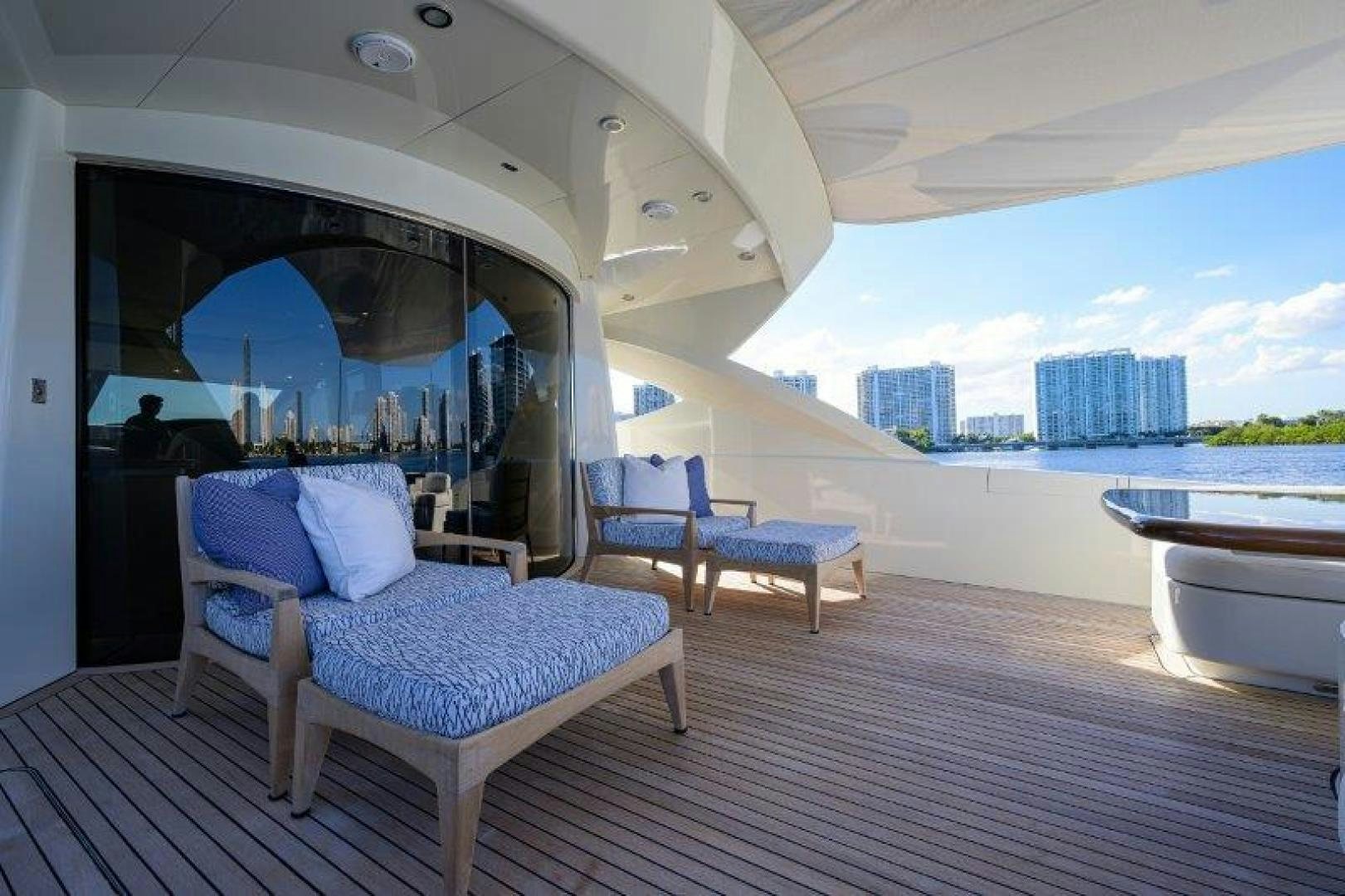 a room with a bed and a view of a city aboard VIRGINIA SEA Yacht for Sale