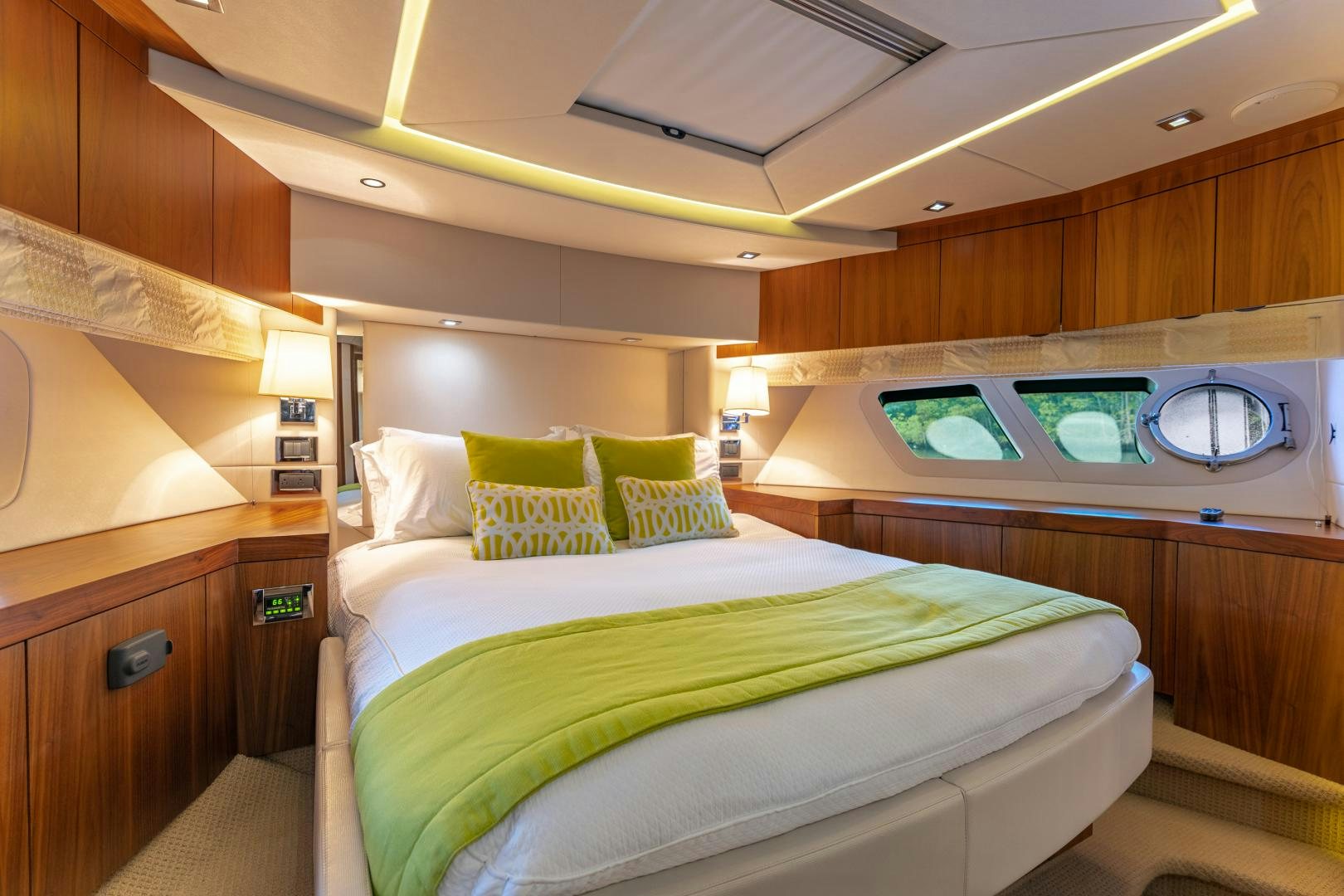 a room with a bed and a television aboard SOL Y LUNA Yacht for Sale
