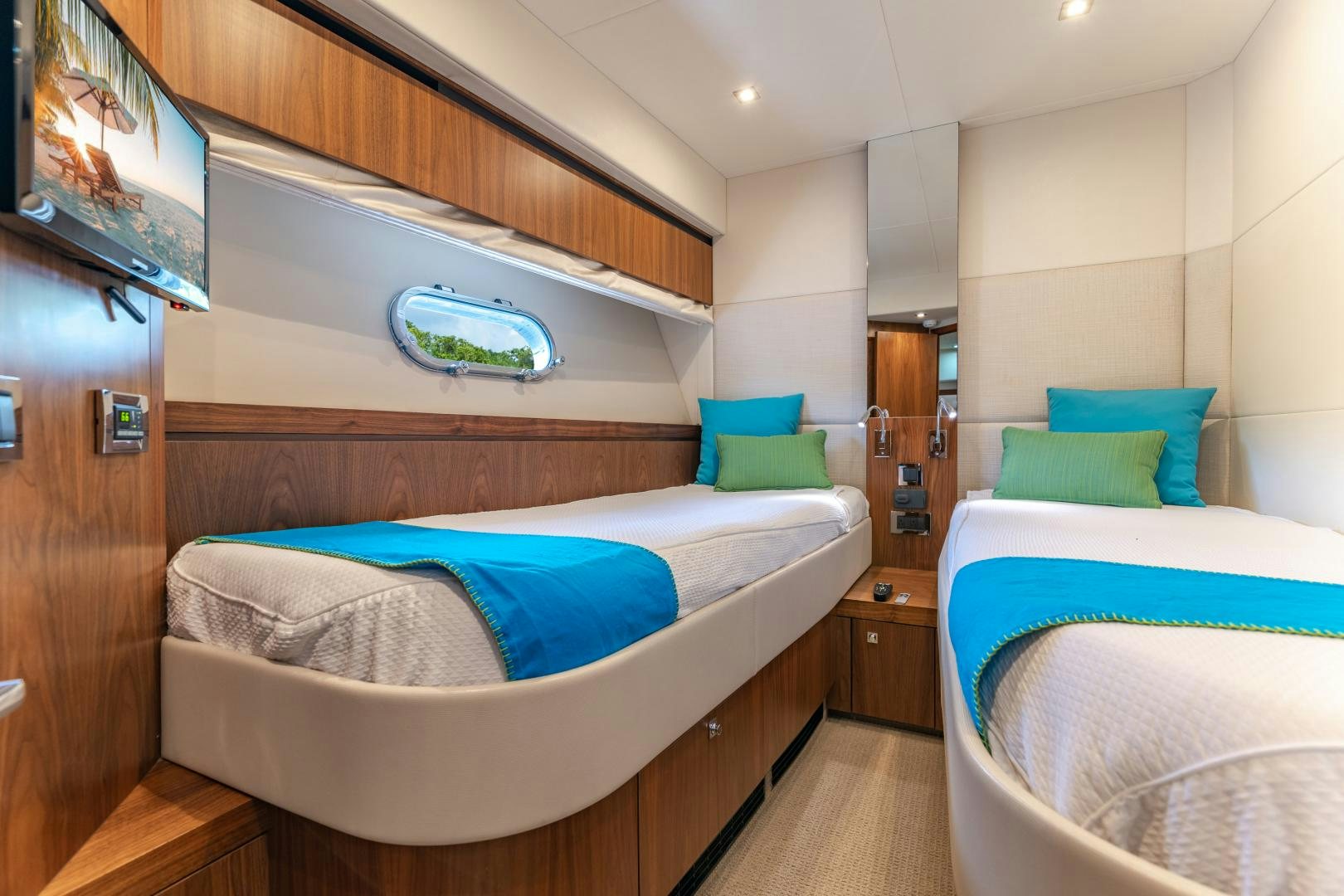 a room with two beds aboard SOL Y LUNA Yacht for Sale