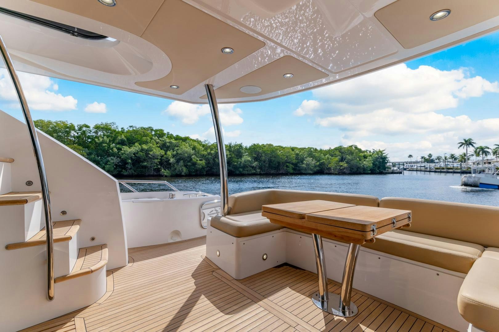 a table and chairs on a boat aboard SOL Y LUNA Yacht for Sale