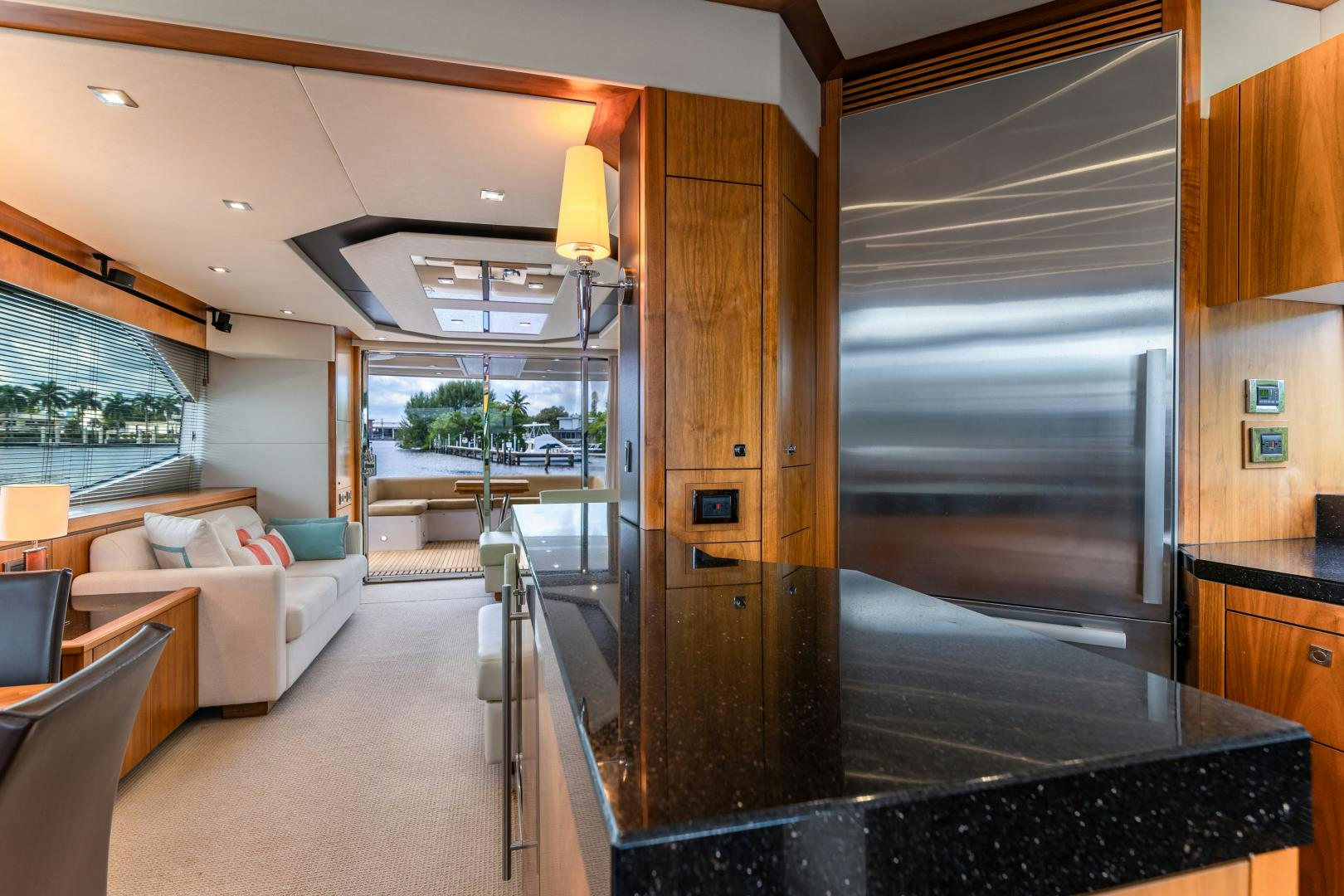 a room with a large glass door aboard SOL Y LUNA Yacht for Sale