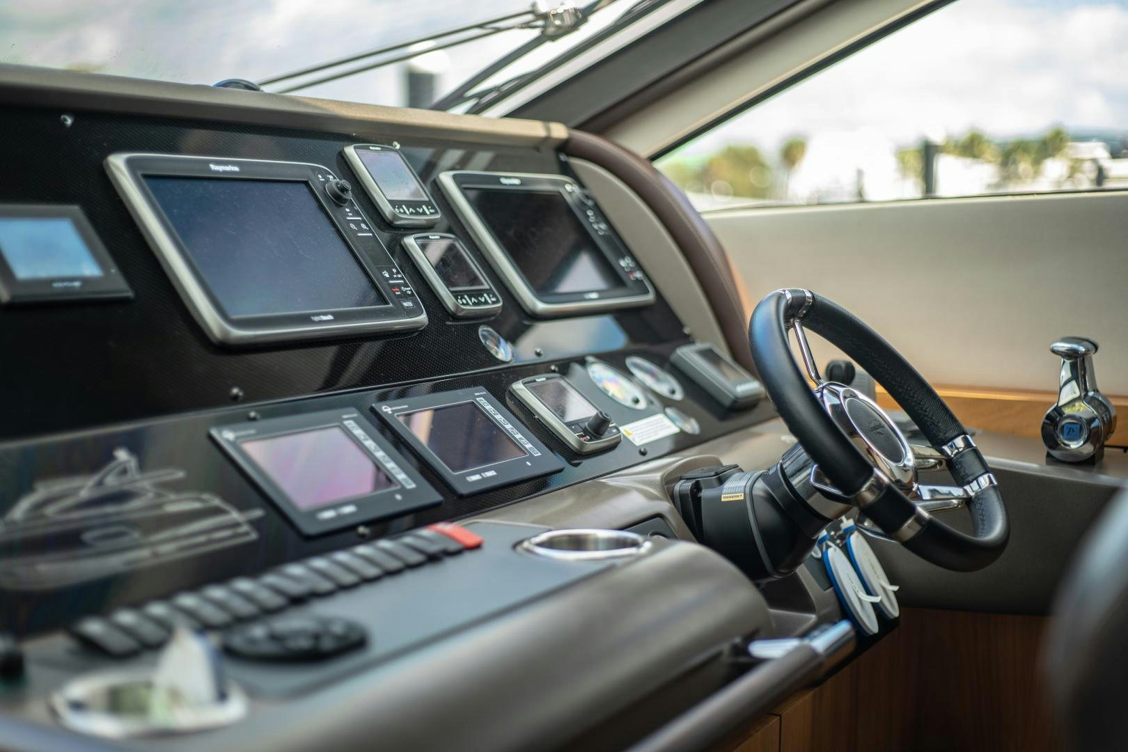 a car with many cell phones in it aboard SOL Y LUNA Yacht for Sale