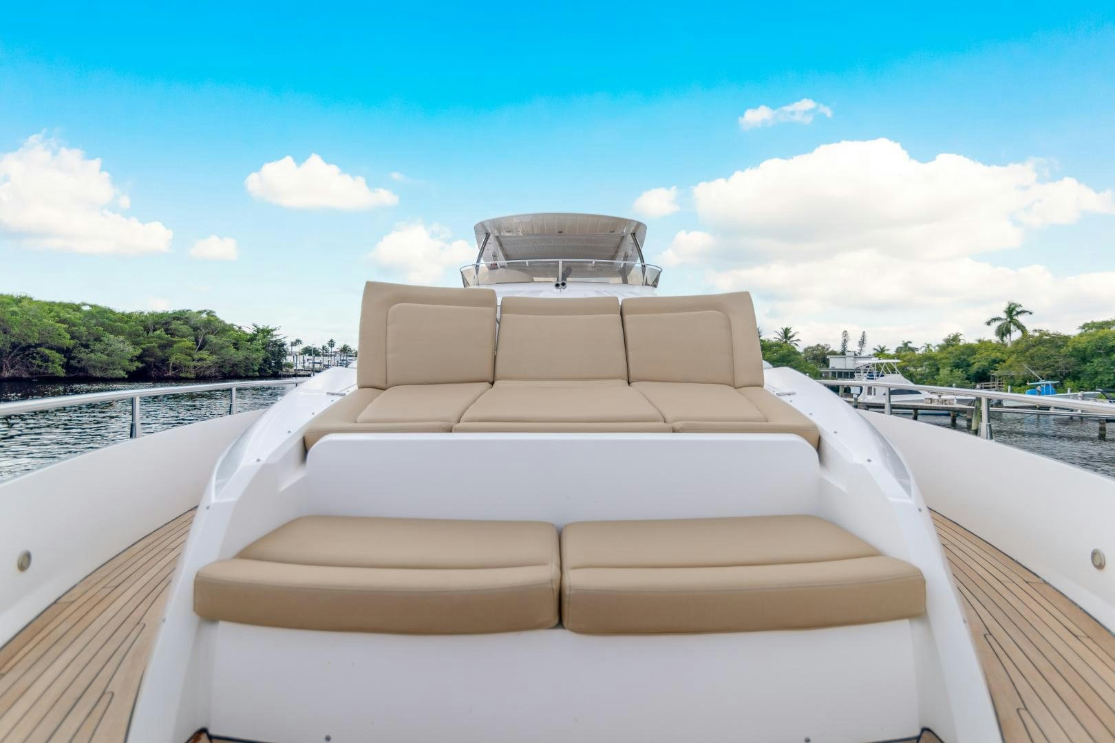 a white boat on a deck aboard SOL Y LUNA Yacht for Sale