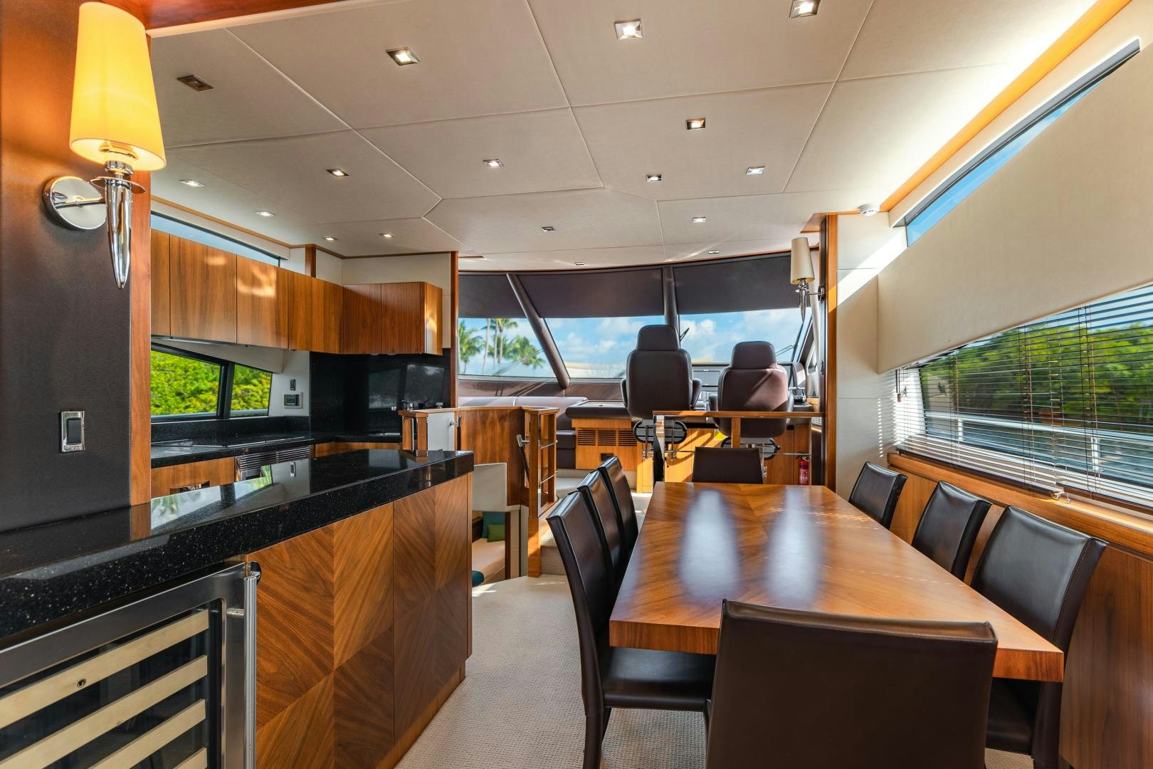 a restaurant with a table and chairs aboard SOL Y LUNA Yacht for Sale