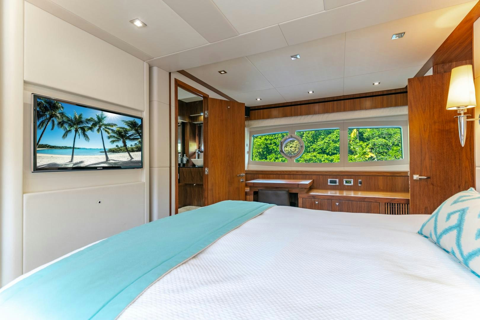 a bed in a room aboard SOL Y LUNA Yacht for Sale