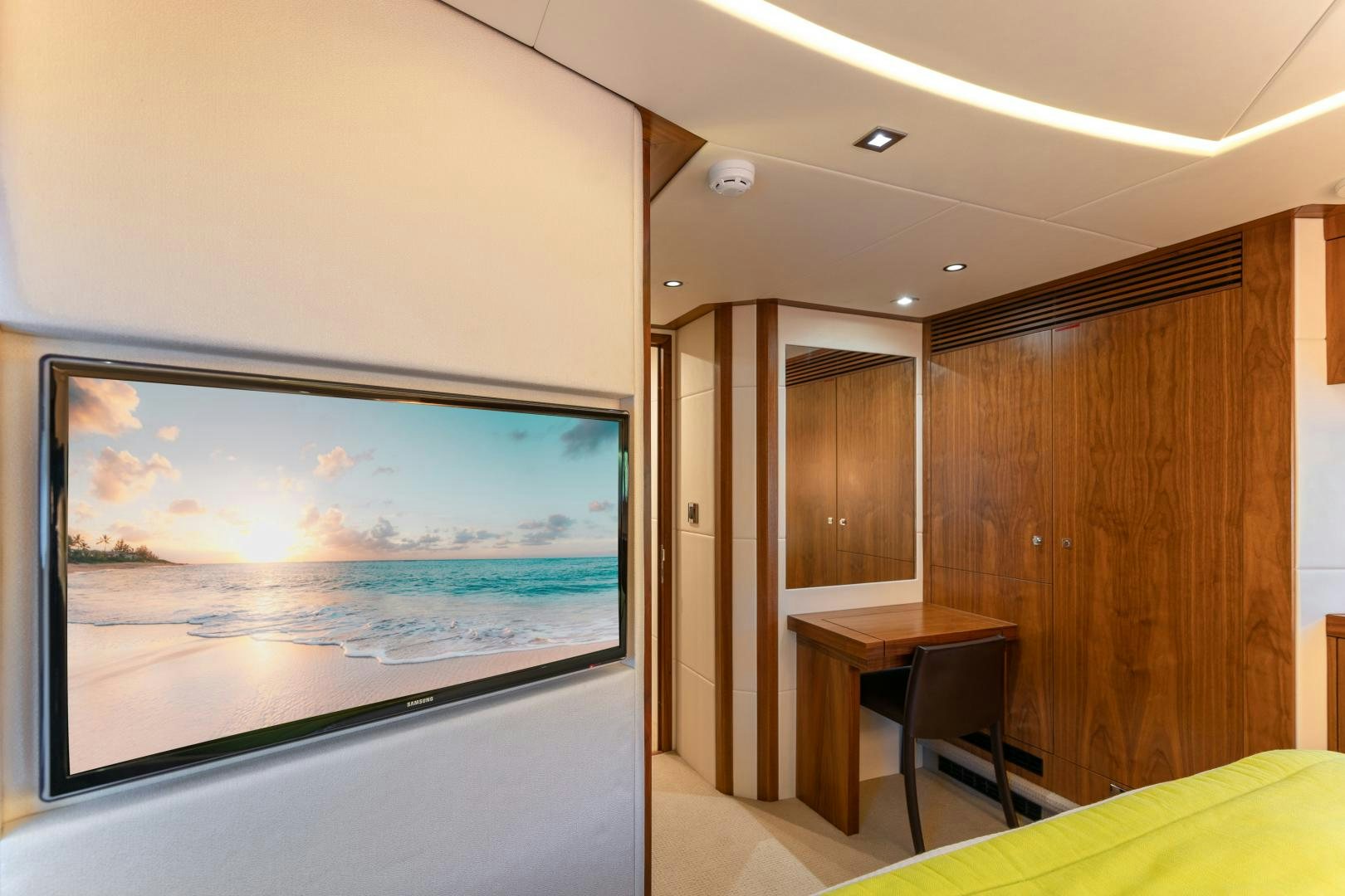 a room with a painting on the wall aboard SOL Y LUNA Yacht for Sale