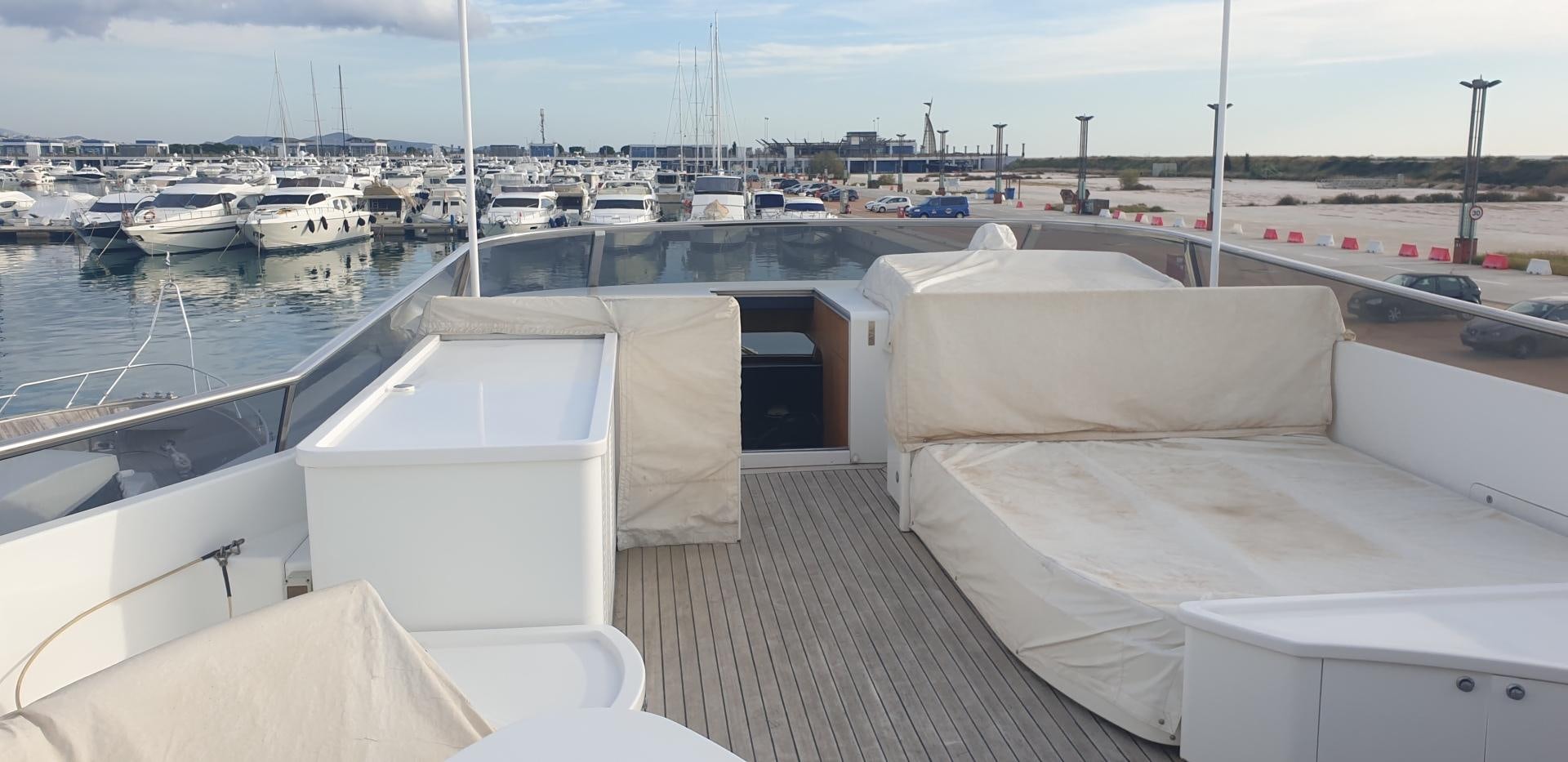 a boat dock with boats aboard TIGRA Yacht for Sale