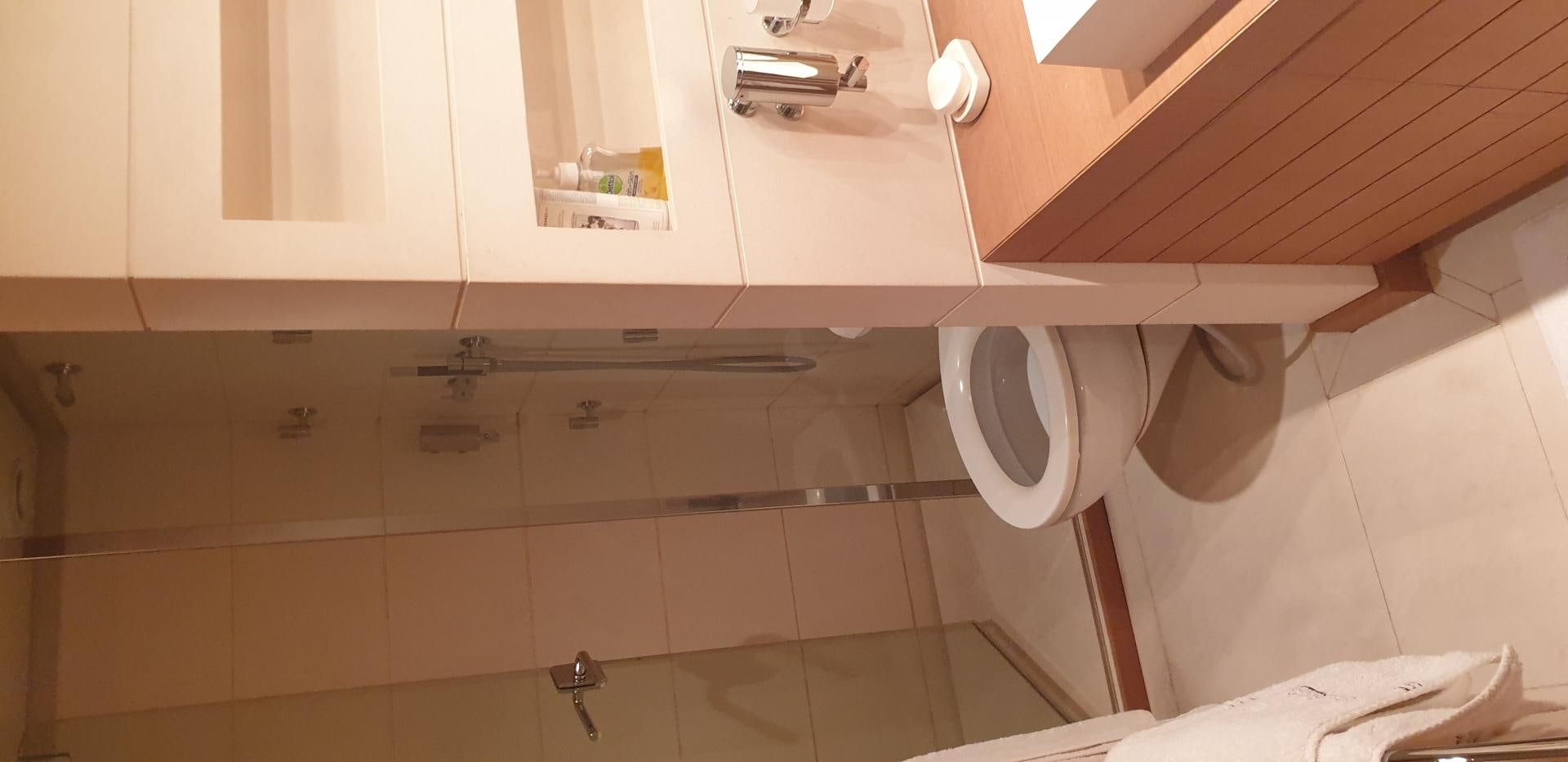 a bathroom with a toilet aboard TIGRA Yacht for Sale