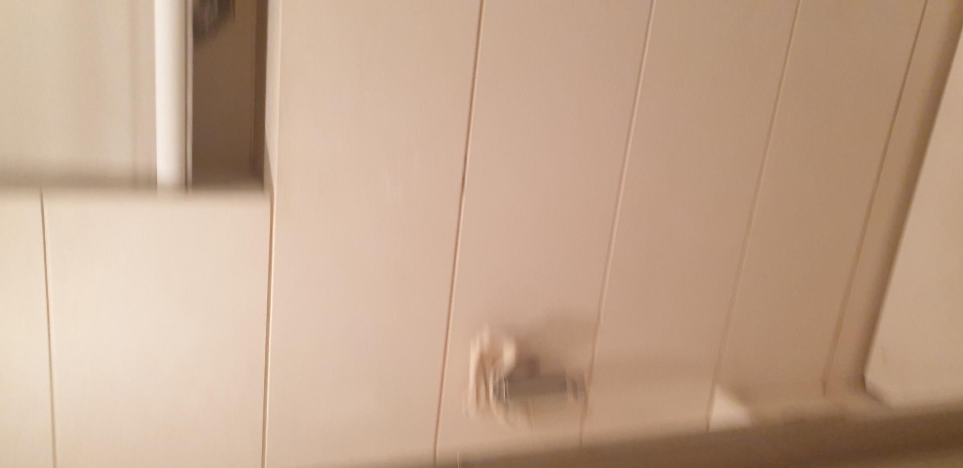 a white door with a handle aboard TIGRA Yacht for Sale