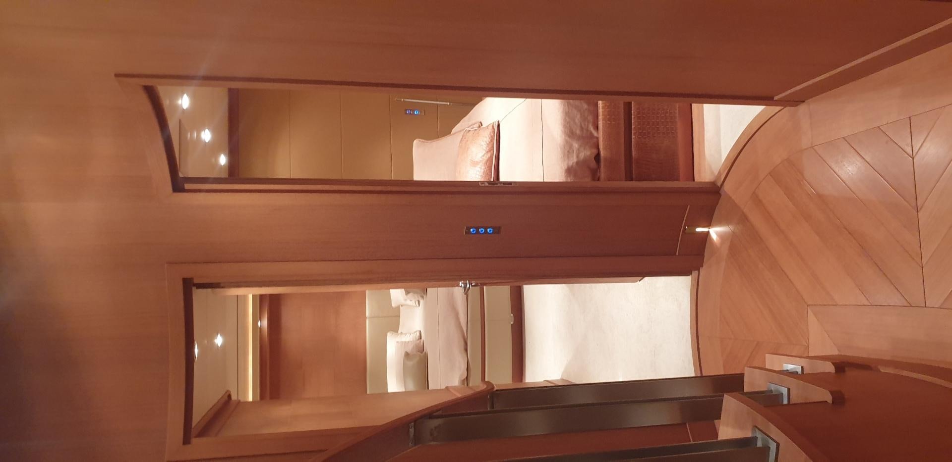 a room with a mirror and a counter aboard TIGRA Yacht for Sale