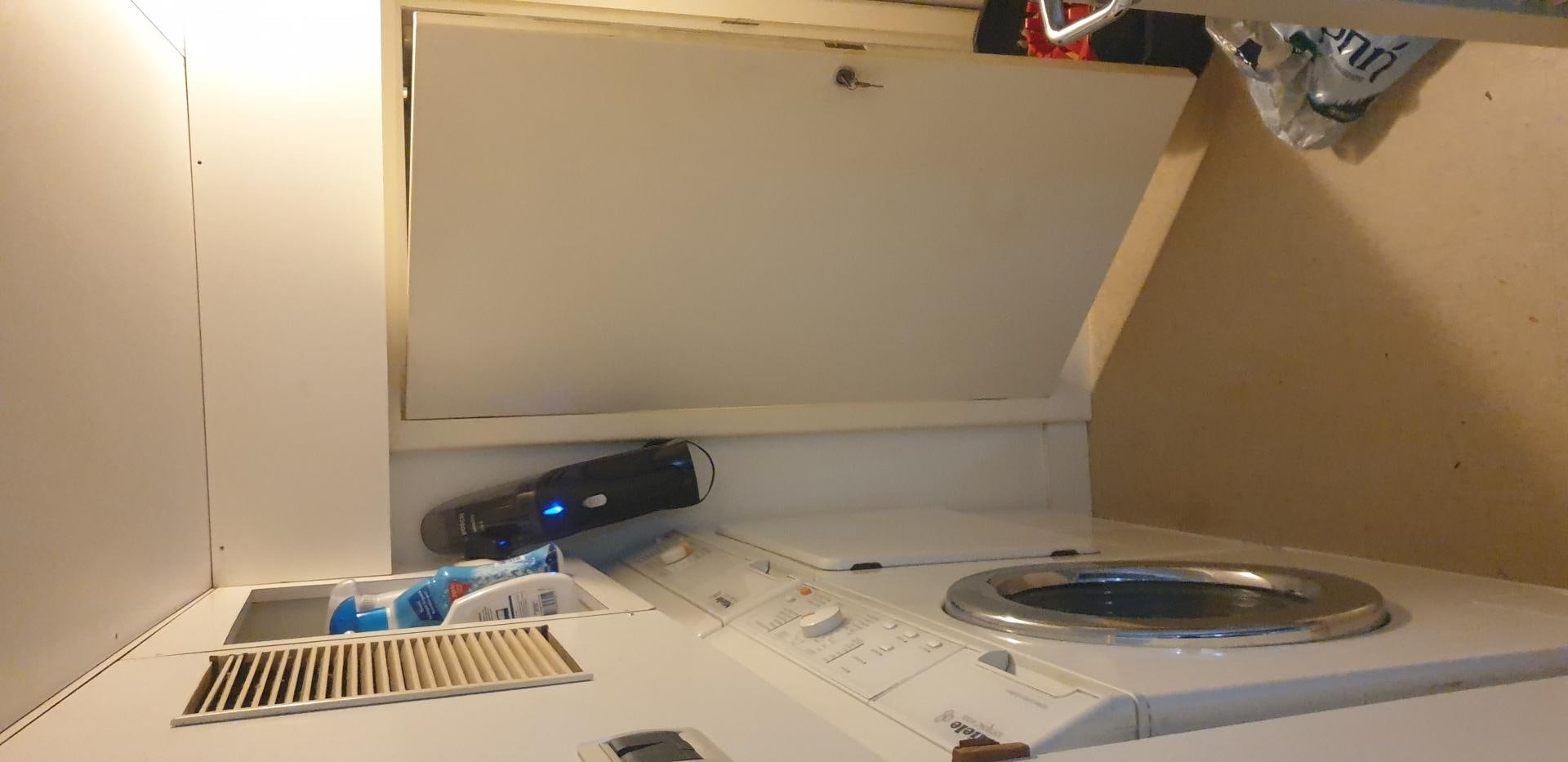 a record player and a record on a table aboard TIGRA Yacht for Sale