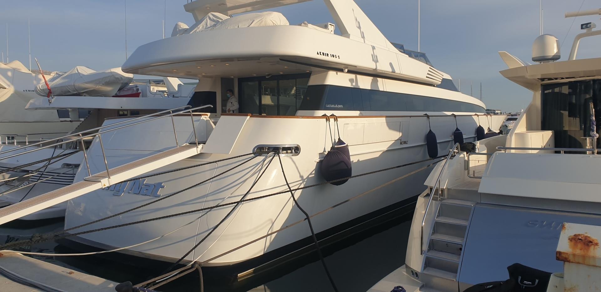 a boat docked at a pier aboard TIGRA Yacht for Sale