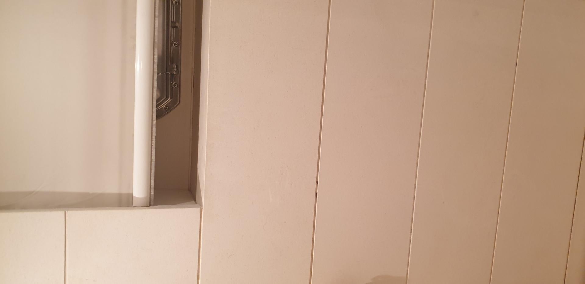 a white wall with a door aboard TIGRA Yacht for Sale