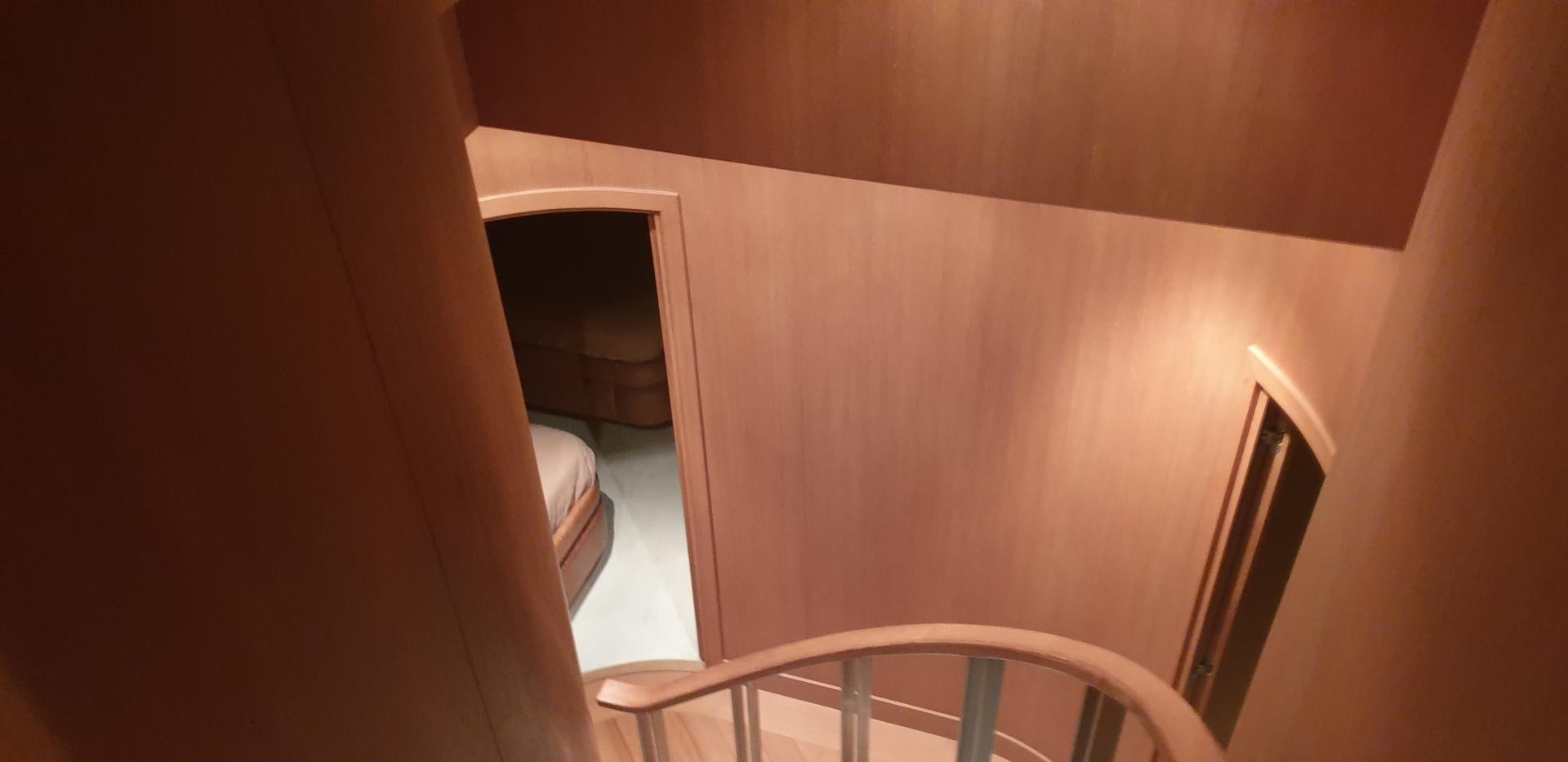 a staircase with a railing aboard TIGRA Yacht for Sale