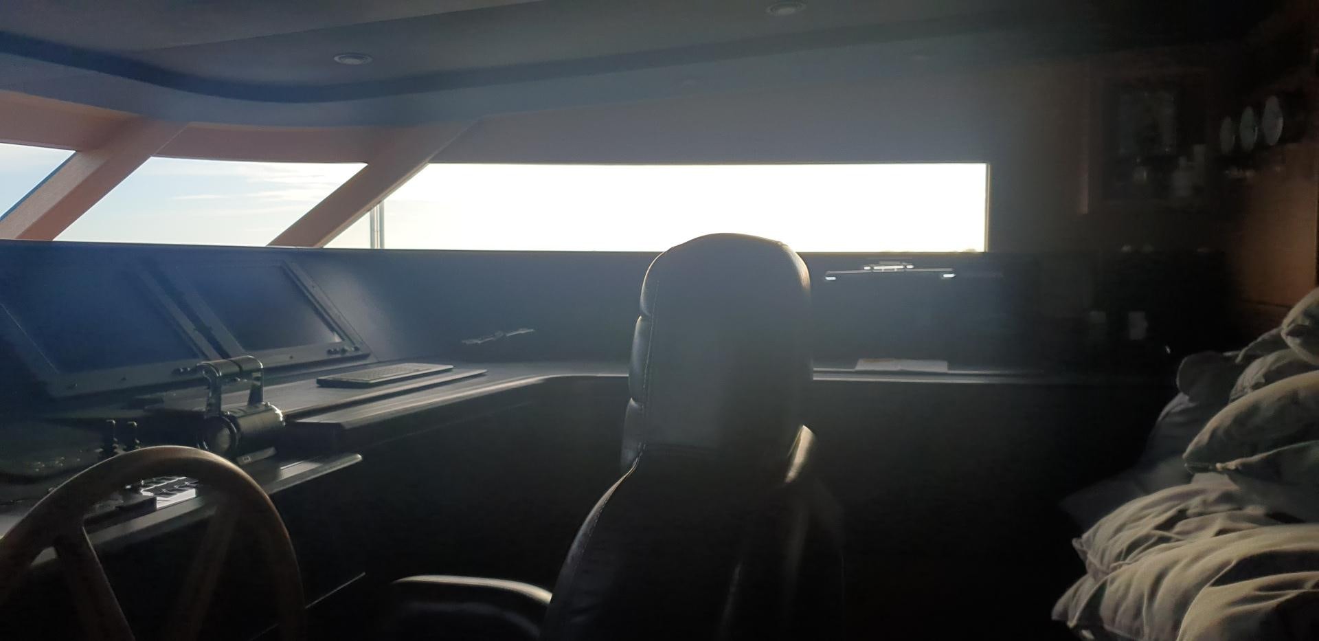 a person sitting in a car aboard TIGRA Yacht for Sale