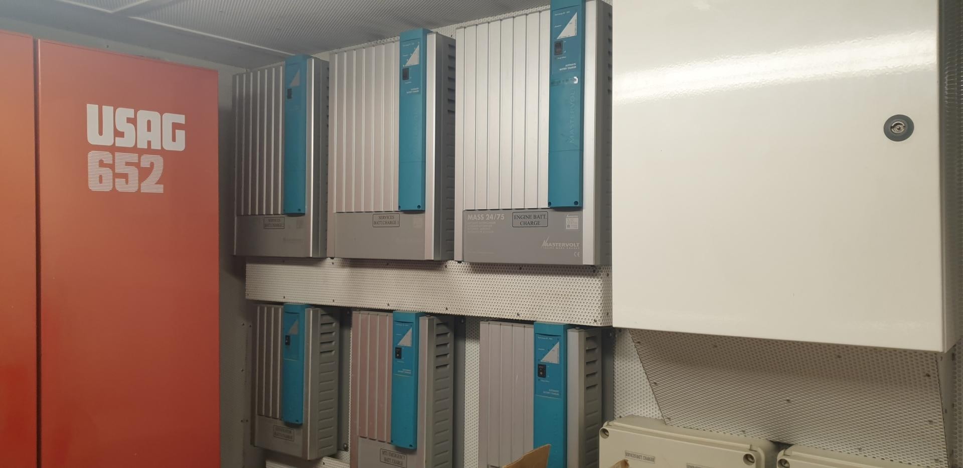 a row of bookshelves aboard TIGRA Yacht for Sale