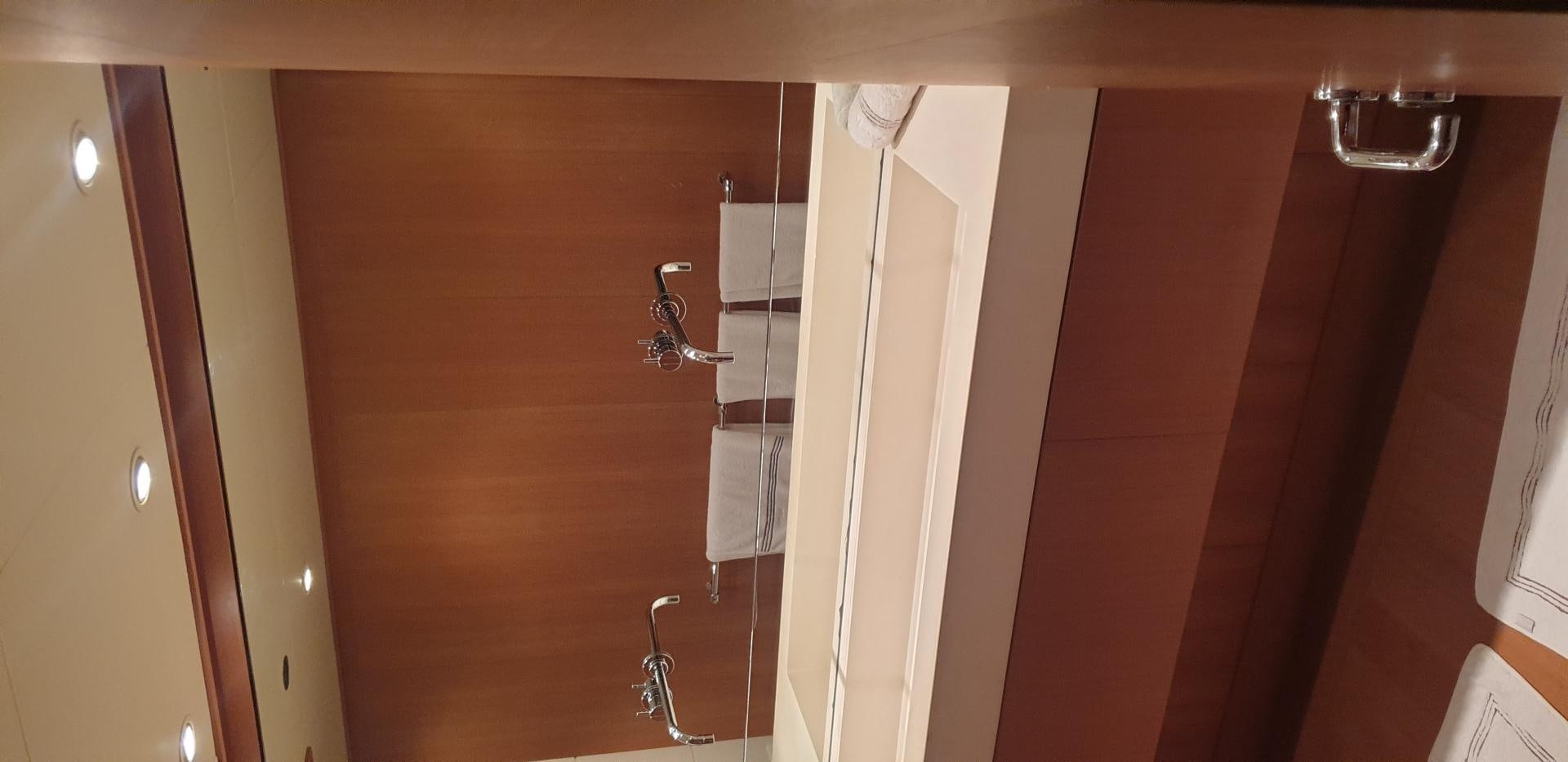 a room with a closet and a door aboard TIGRA Yacht for Sale