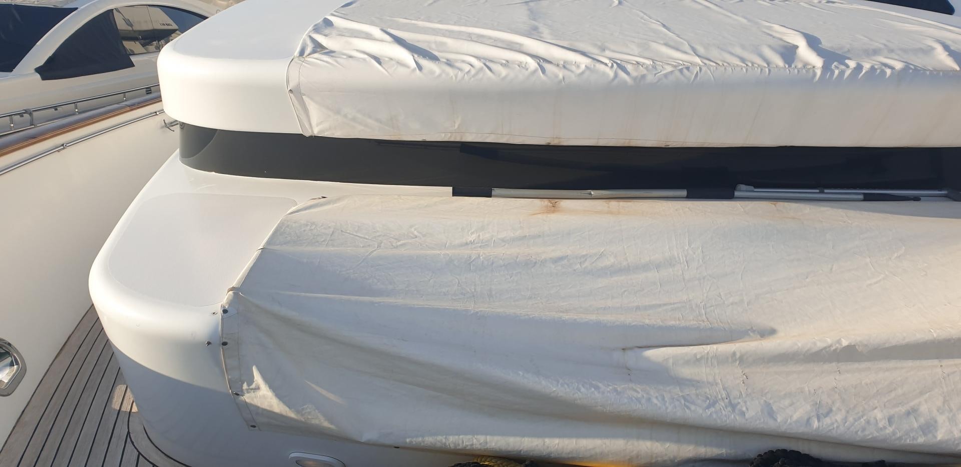 a white car parked on a snowy road aboard TIGRA Yacht for Sale