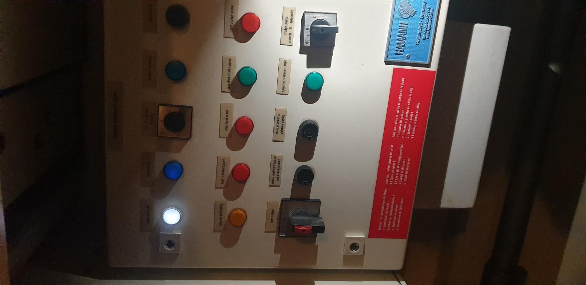 a white rectangular object with a red and blue screen and buttons aboard TIGRA Yacht for Sale