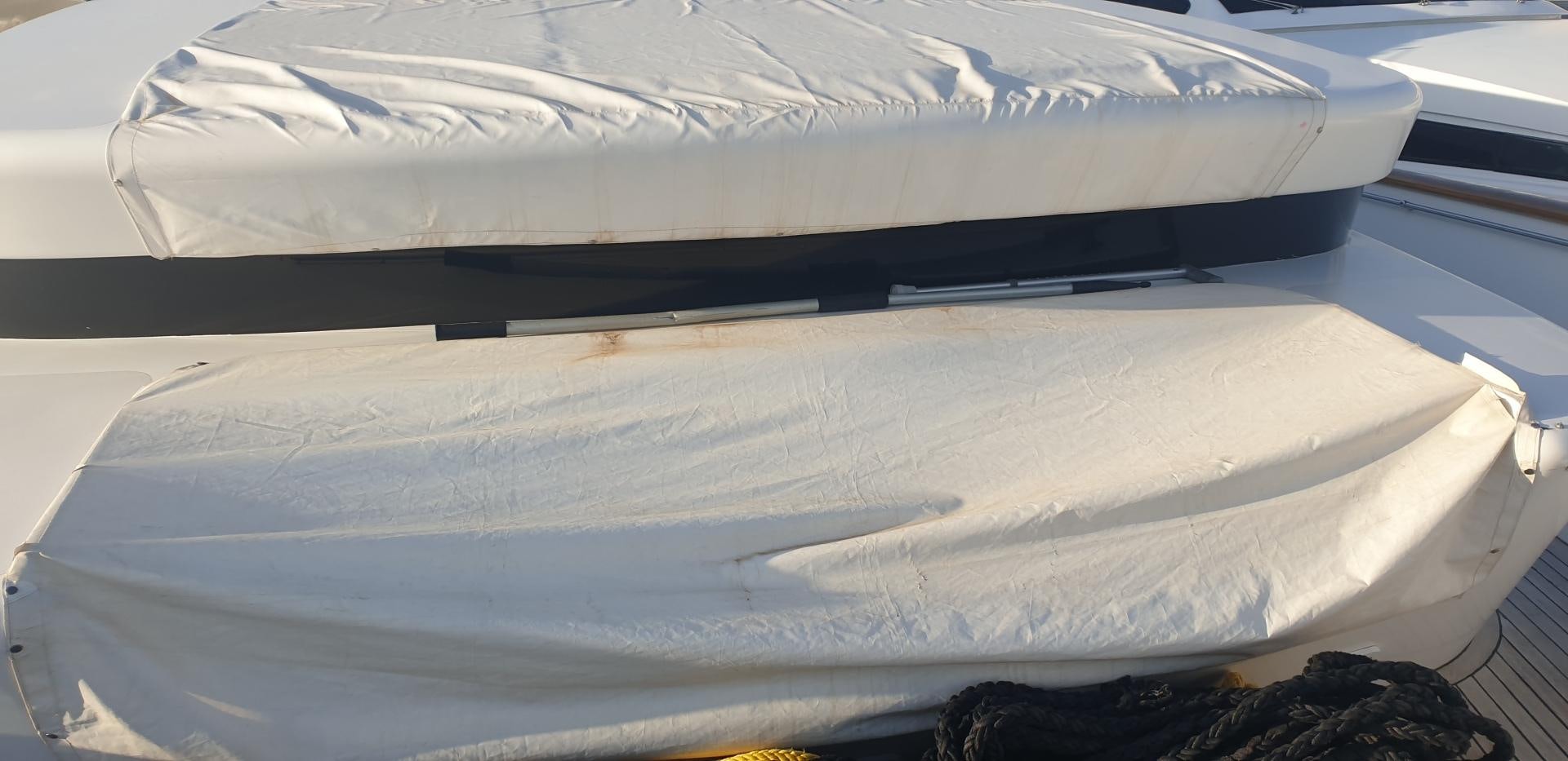 a stack of white plastic aboard TIGRA Yacht for Sale