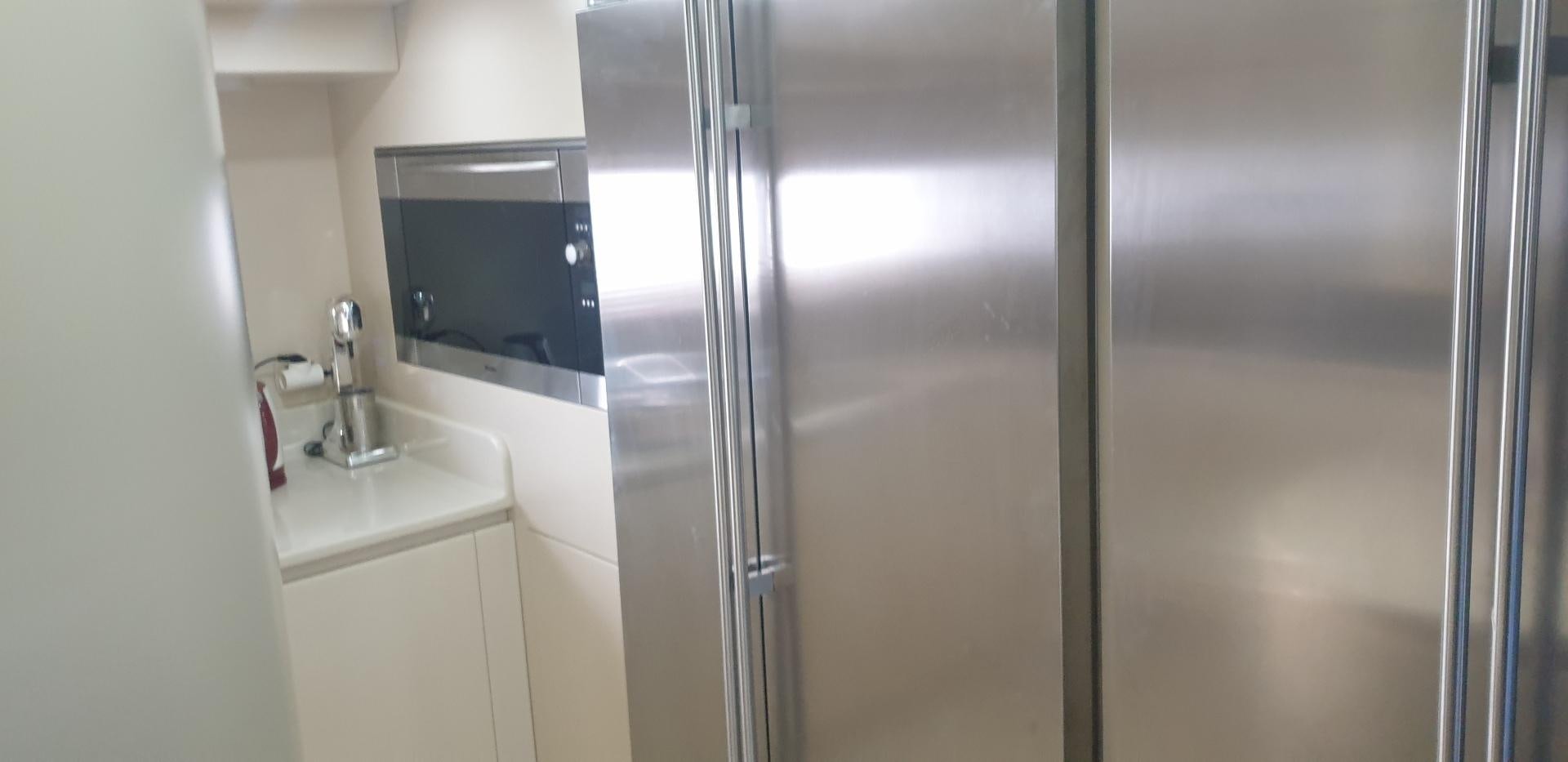 a bathroom with a shower unit and sink aboard TIGRA Yacht for Sale