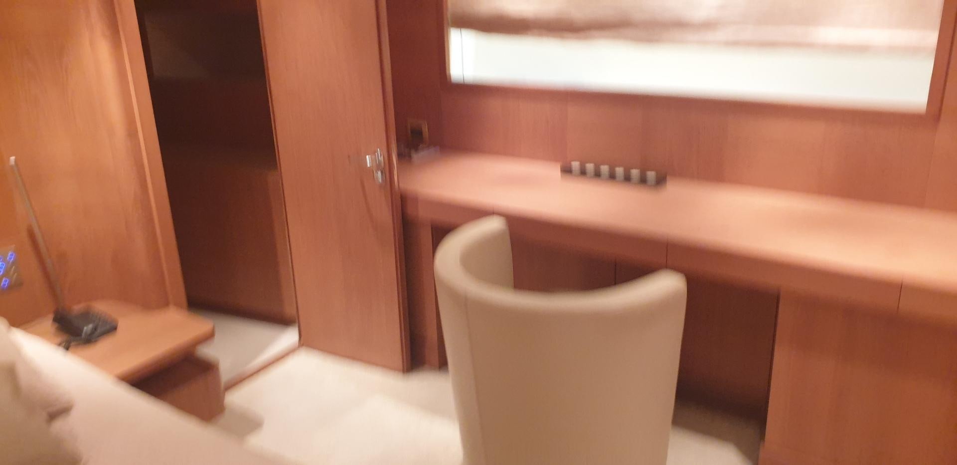 a chair next to a counter aboard TIGRA Yacht for Sale