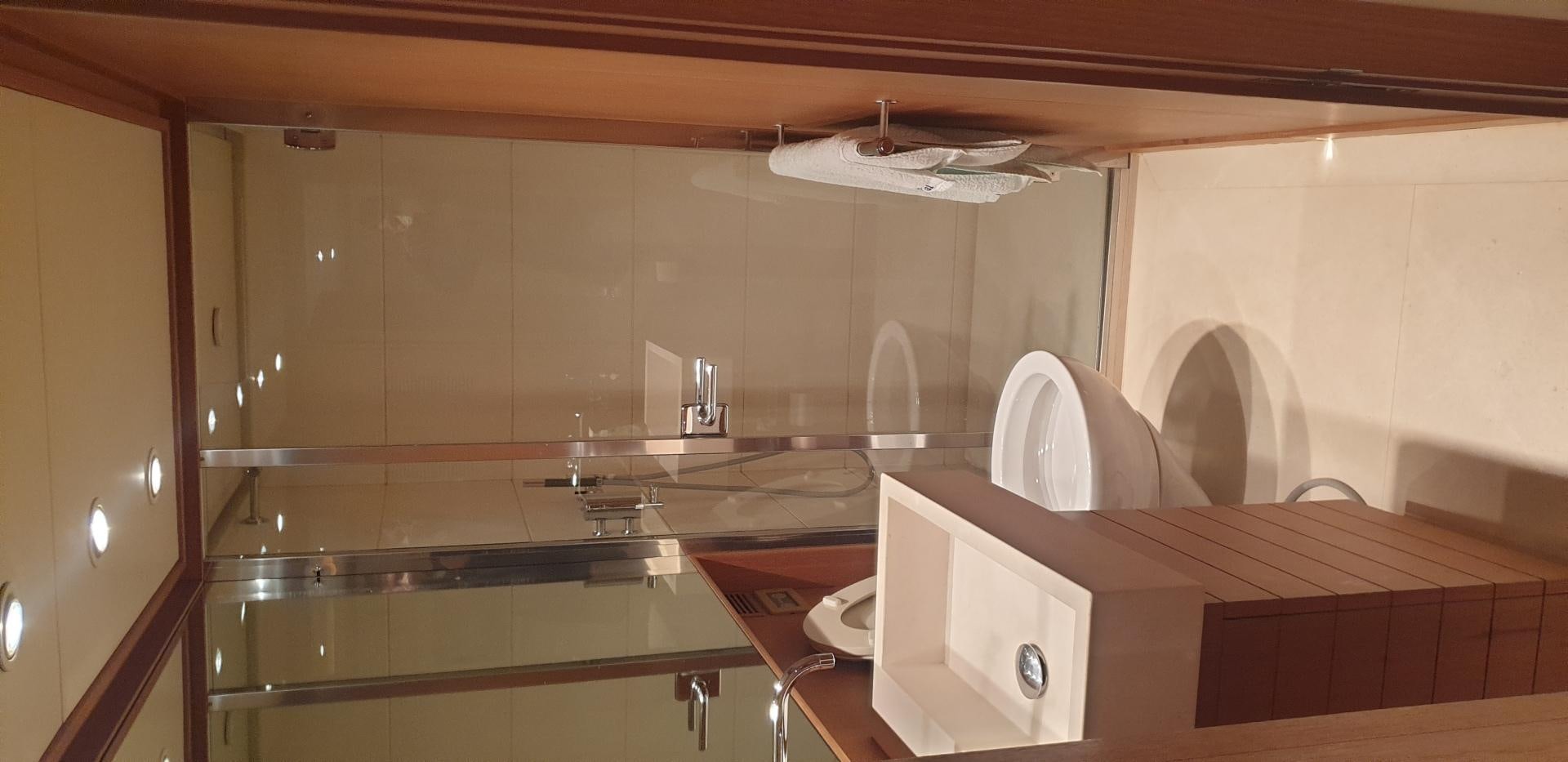 a kitchen with a sink and cabinets aboard TIGRA Yacht for Sale
