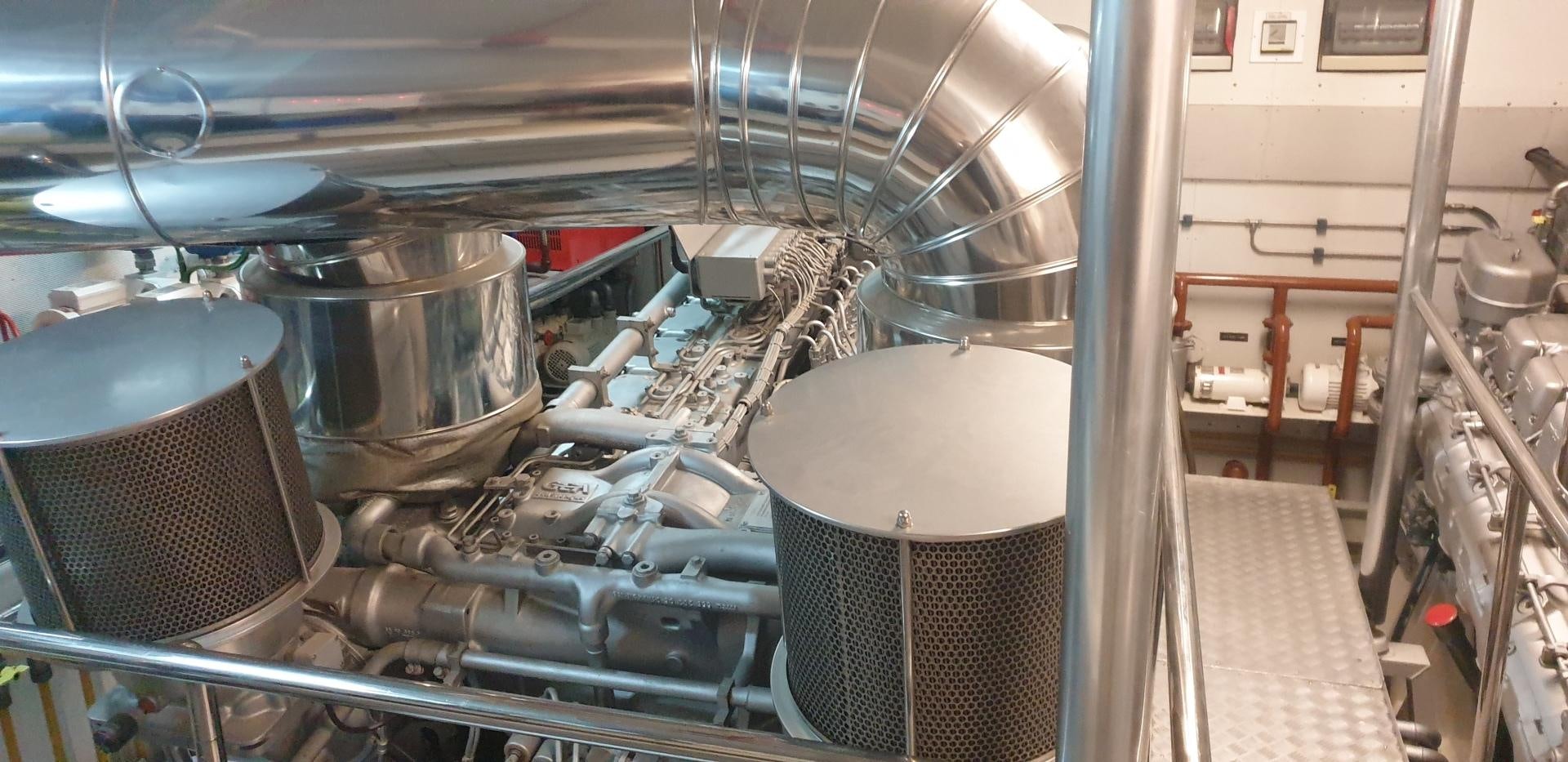 a room with a large metal drum aboard TIGRA Yacht for Sale