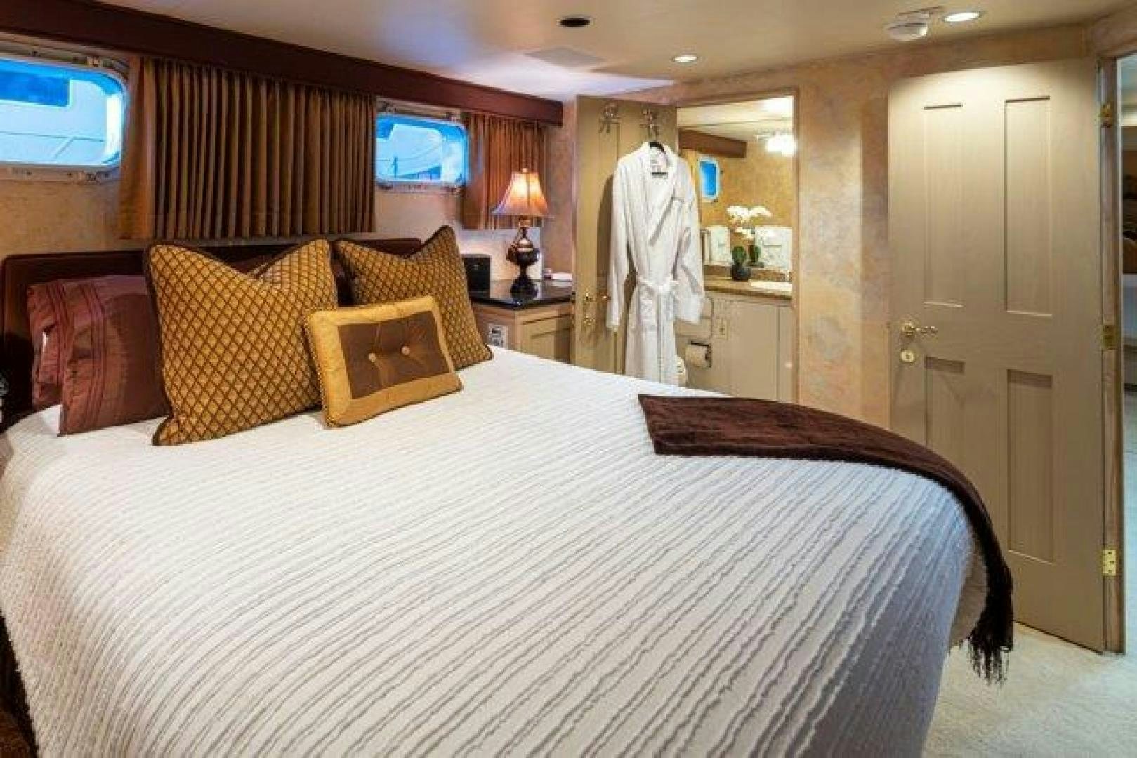 a hotel room with a bed aboard ANDIAMO Yacht for Sale