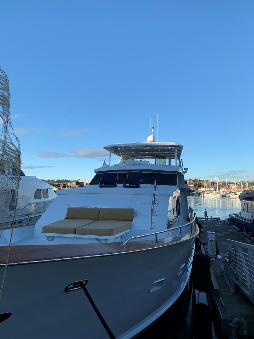 a boat docked at a pier aboard ANDIAMO Yacht for Sale