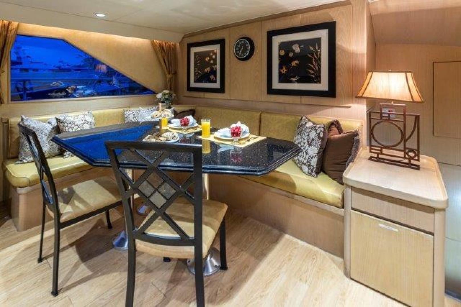 a living room with a pool table aboard ANDIAMO Yacht for Sale