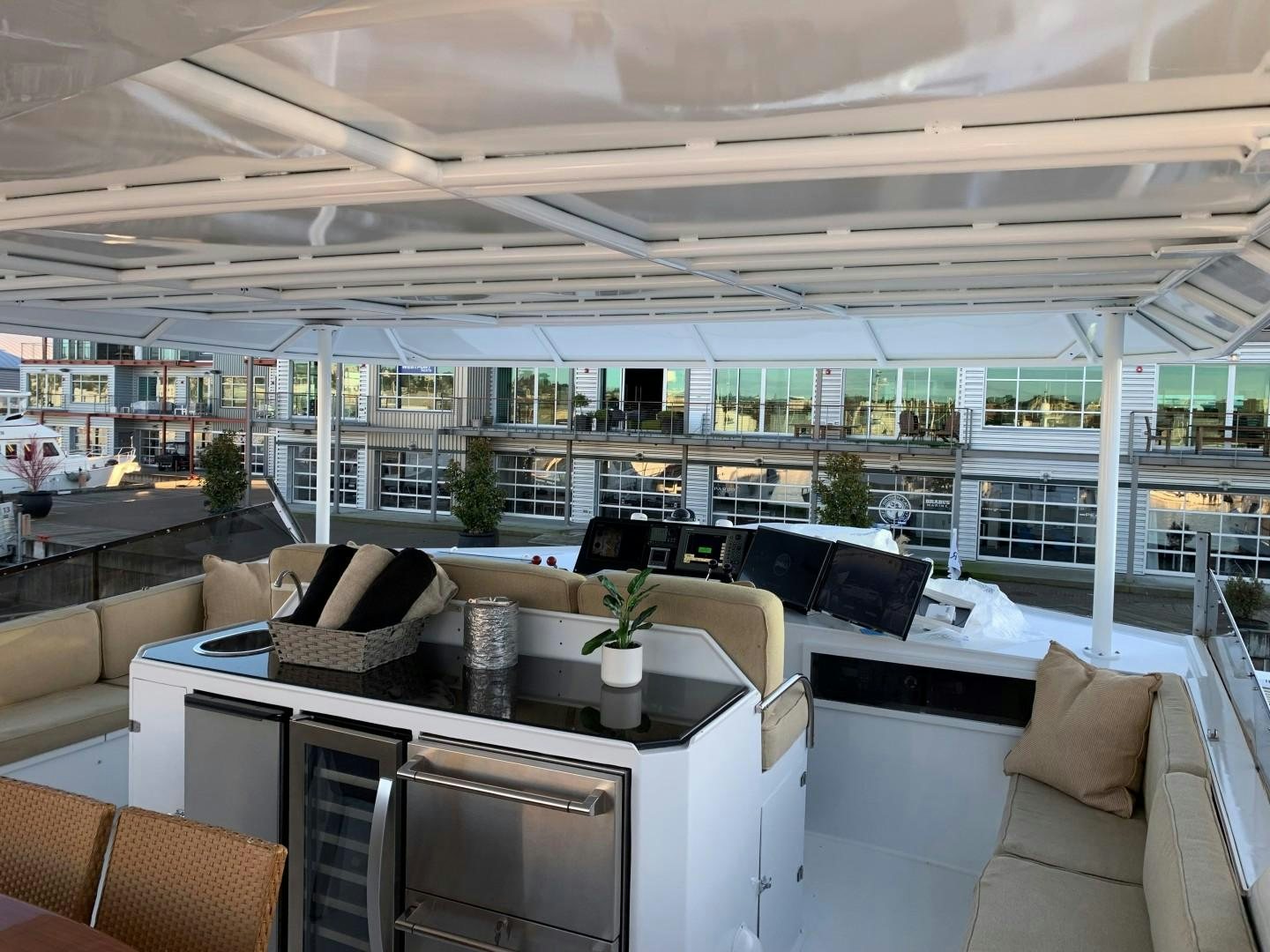 a room with a table and chairs aboard ANDIAMO Yacht for Sale