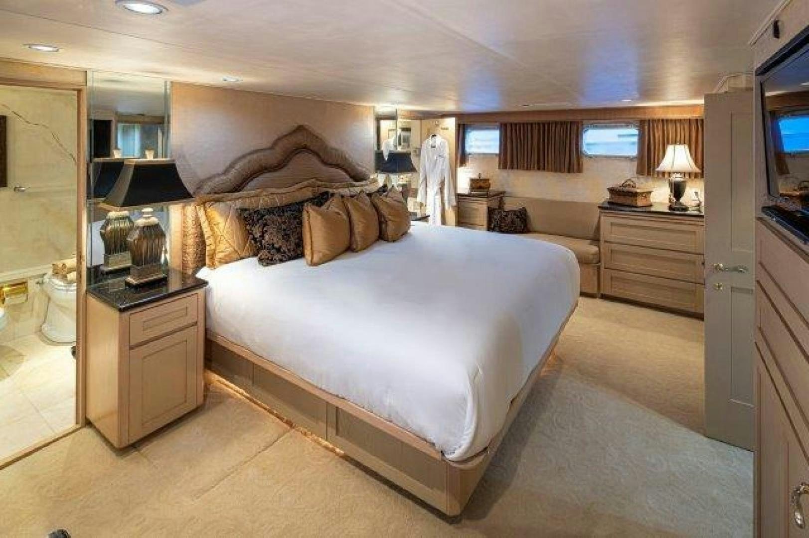 a large bedroom with a large bed aboard ANDIAMO Yacht for Sale