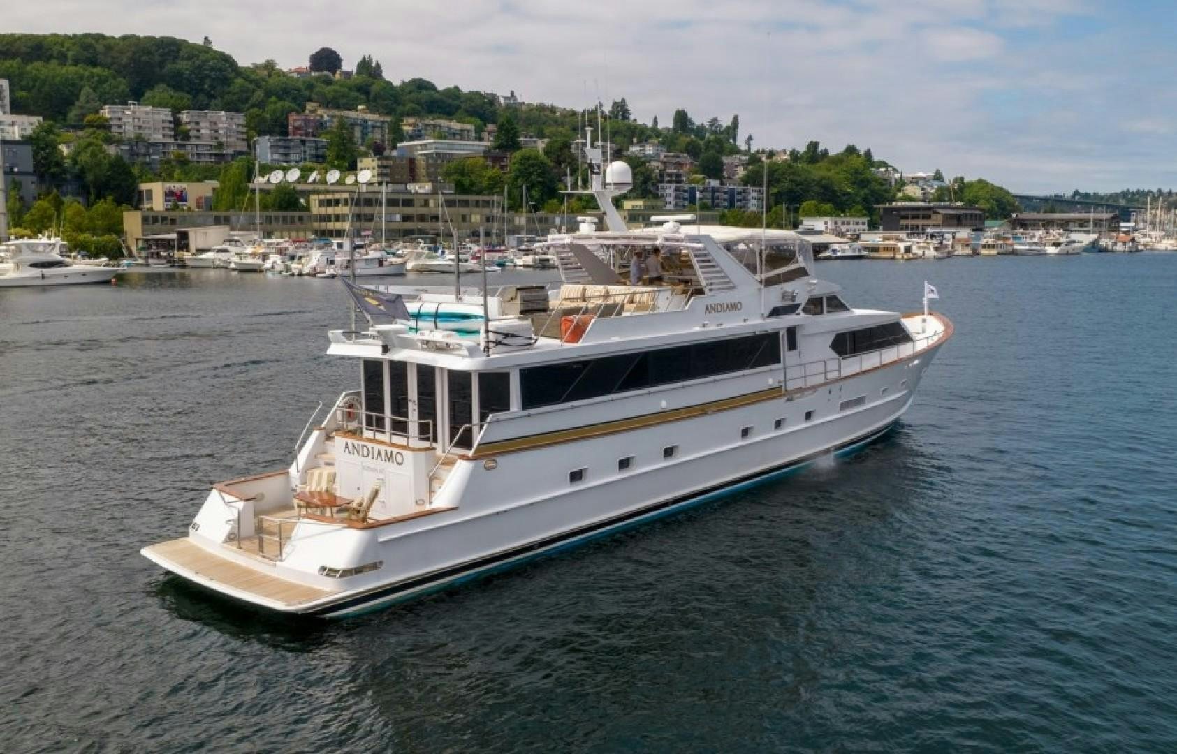 a white yacht in the water aboard ANDIAMO Yacht for Sale