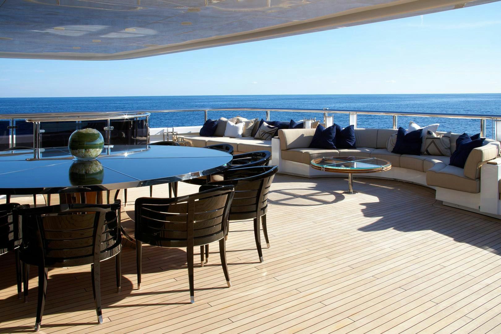 a living room with a couch and table aboard SEALYON Yacht for Sale