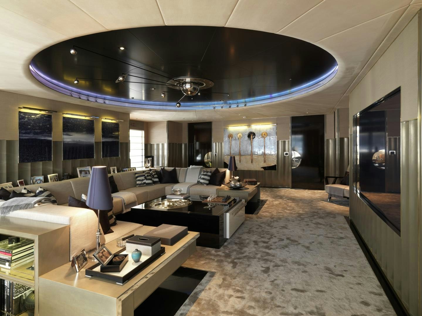 a large room with a large screen aboard SEALYON Yacht for Sale