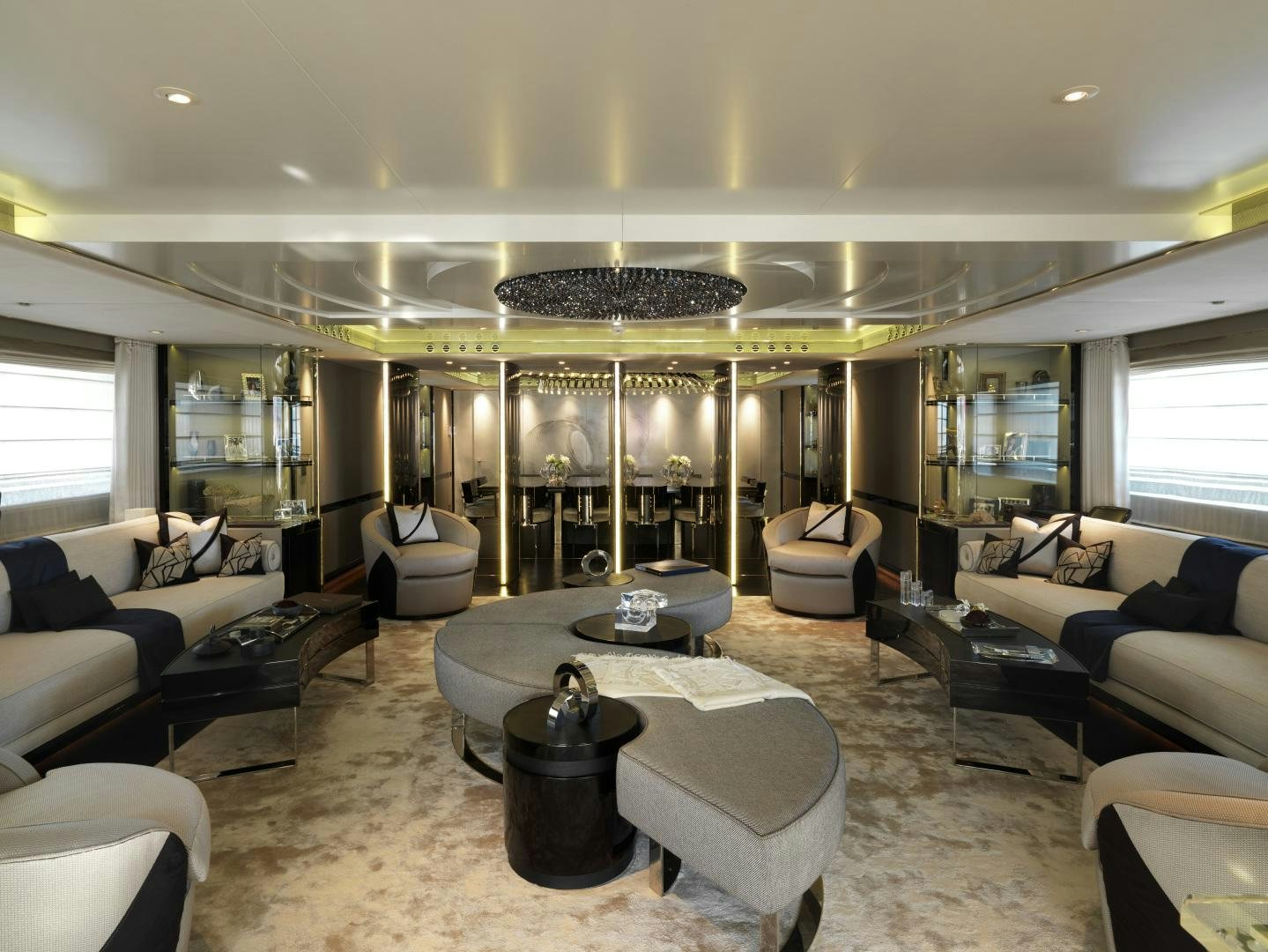 a large living room with a large glass wall aboard SEALYON Yacht for Sale