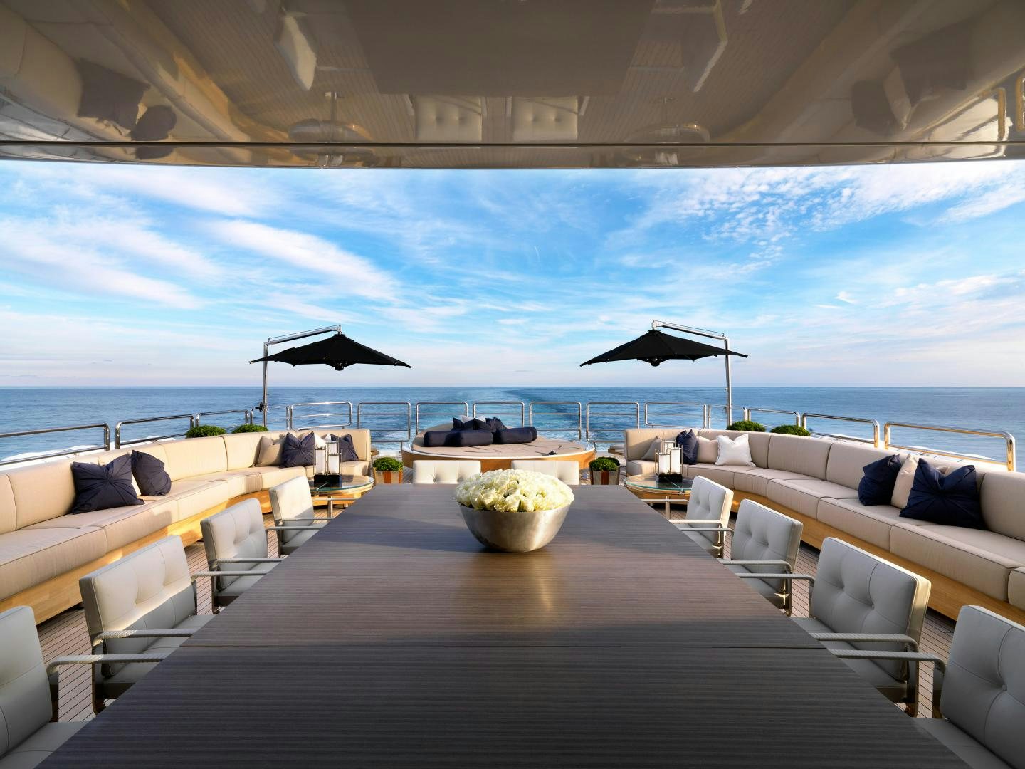 a large lounge area with a large patio and a large body of water aboard SEALYON Yacht for Sale