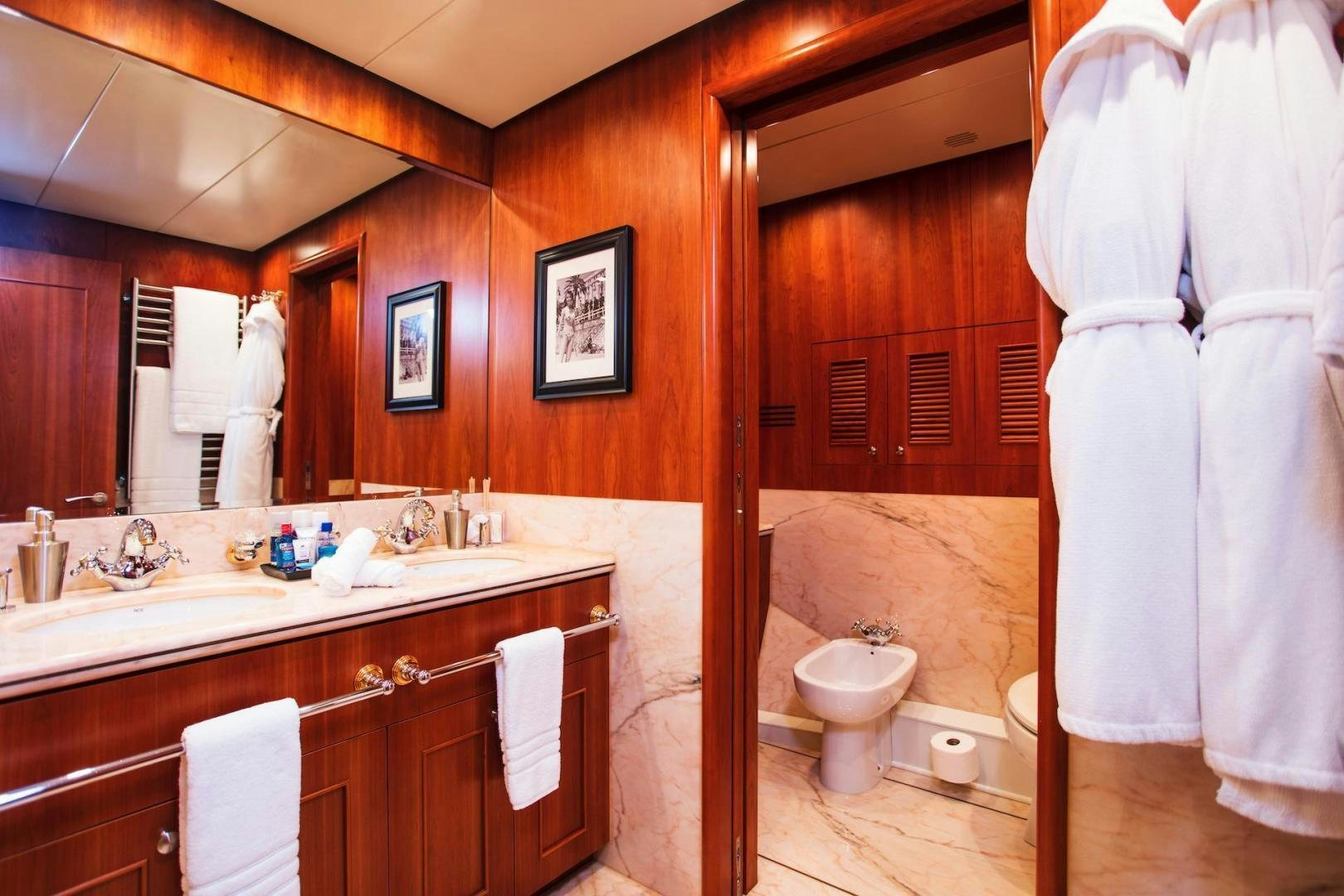 a bathroom with a sink and a toilet aboard STAY SALTY Yacht for Sale