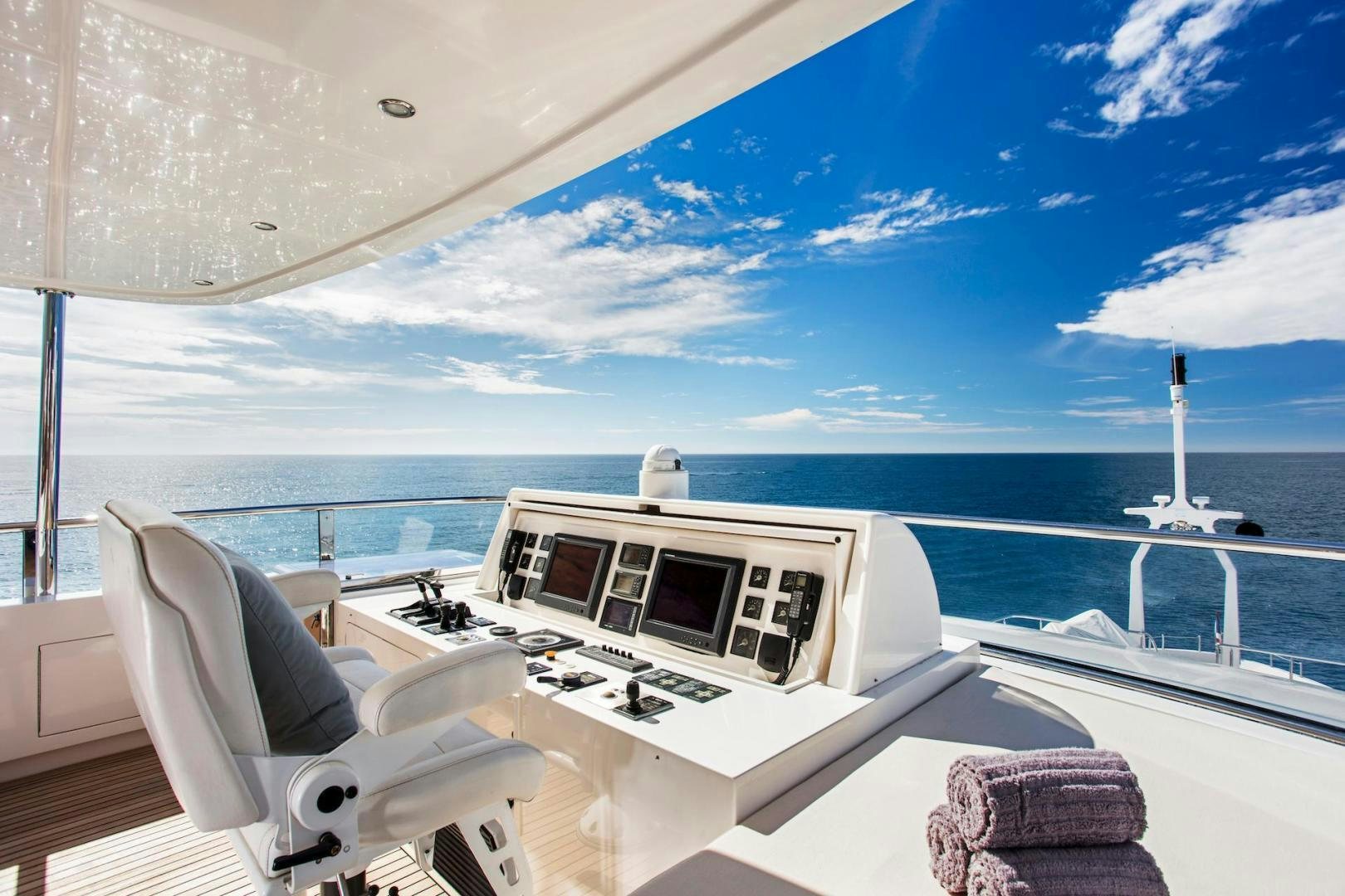 a large white bed on a boat aboard STAY SALTY Yacht for Sale