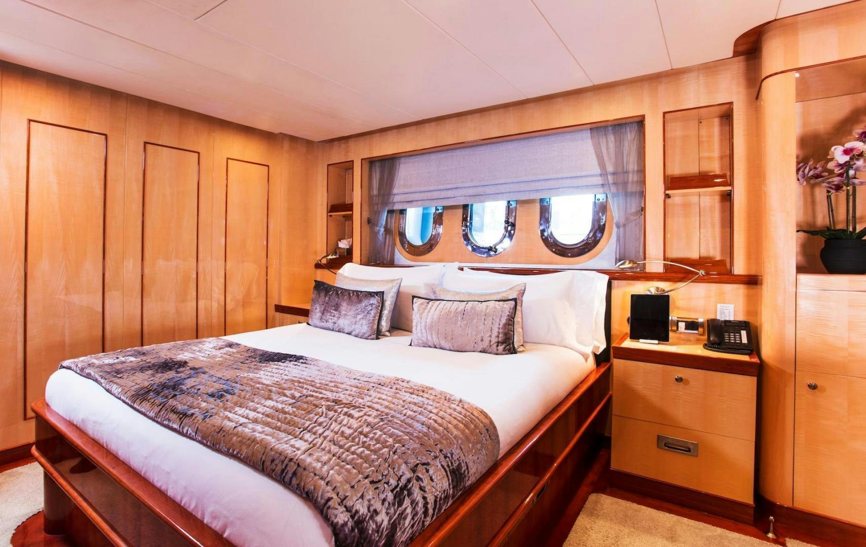 a bedroom with a large bed aboard STAY SALTY Yacht for Sale
