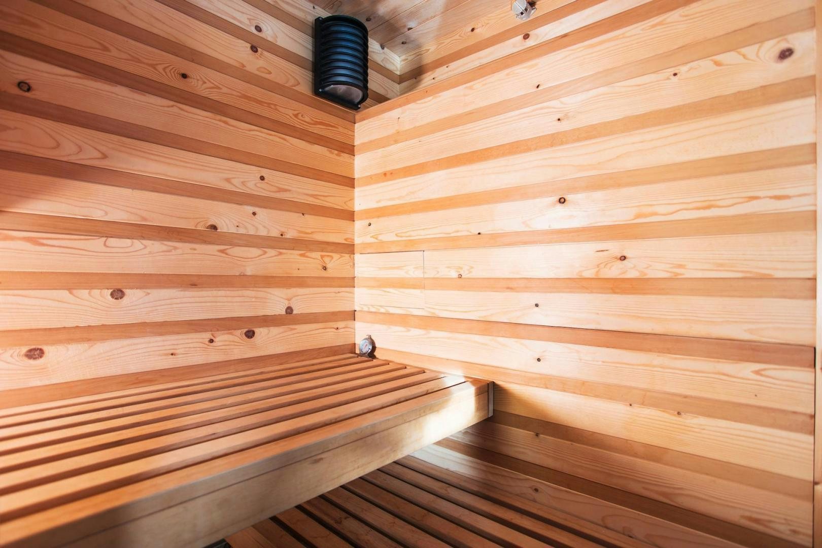 a wooden wall with a light aboard STAY SALTY Yacht for Sale