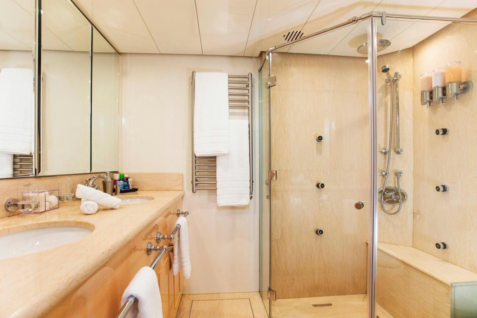 a bathroom with a shower unit and sink aboard STAY SALTY Yacht for Sale