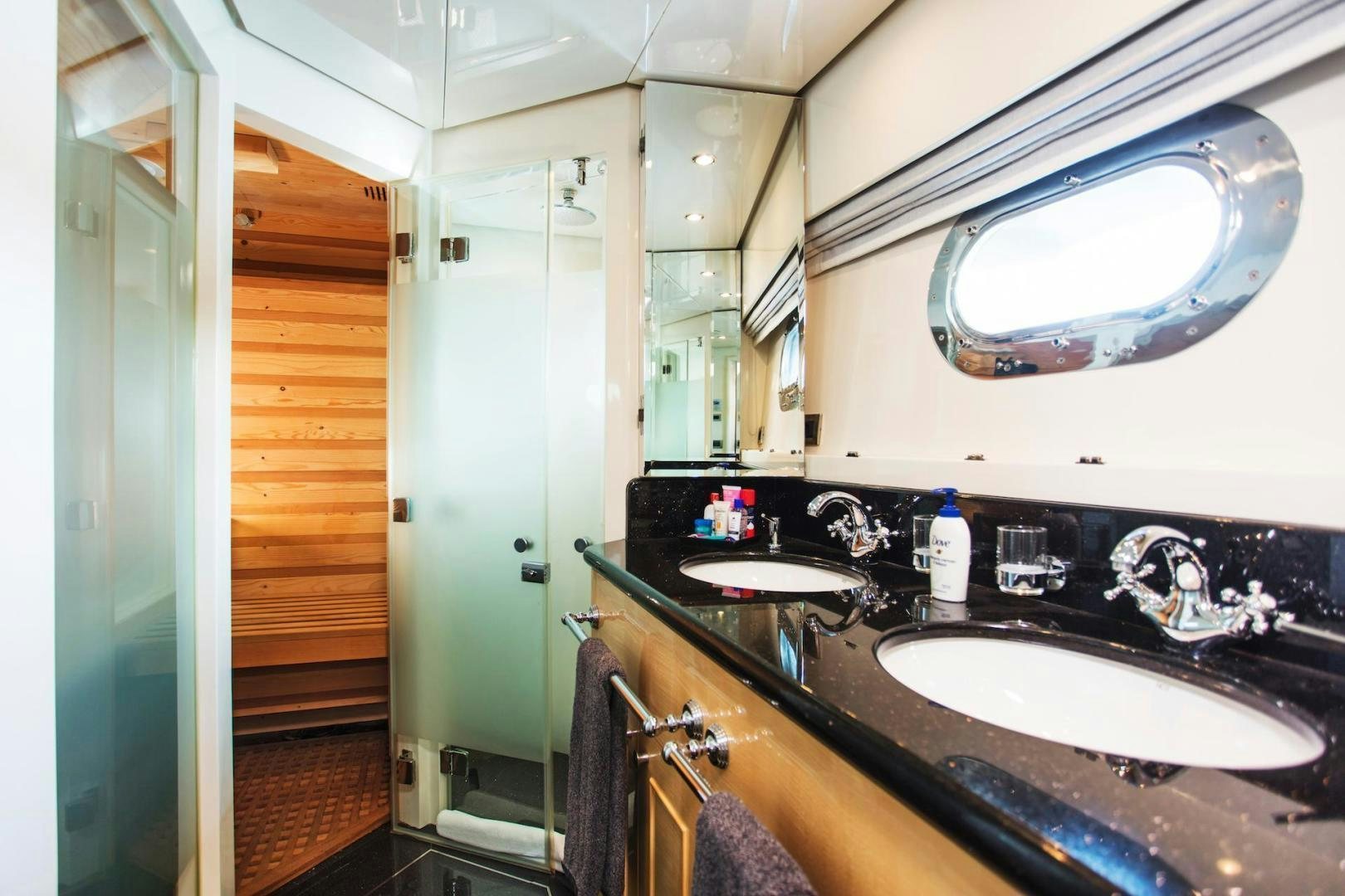 a bathroom with sinks and mirrors aboard STAY SALTY Yacht for Sale