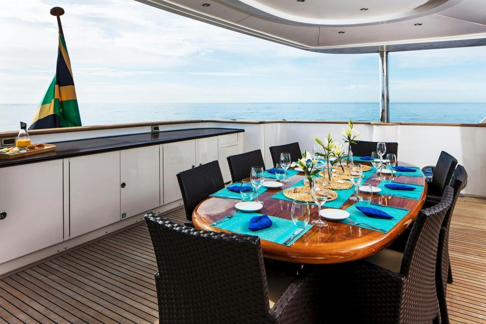 a dining table set for a dinner aboard STAY SALTY Yacht for Sale