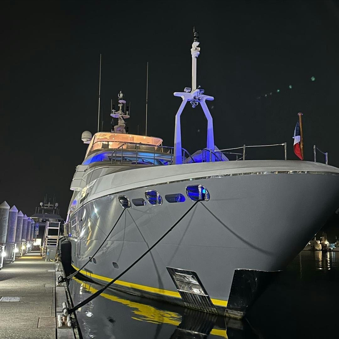 a large ship with a statue on it aboard STAY SALTY Yacht for Sale