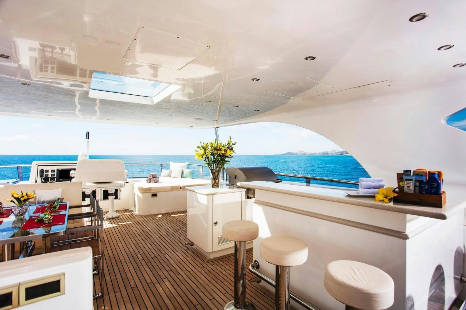 a room with a table and chairs aboard STAY SALTY Yacht for Sale
