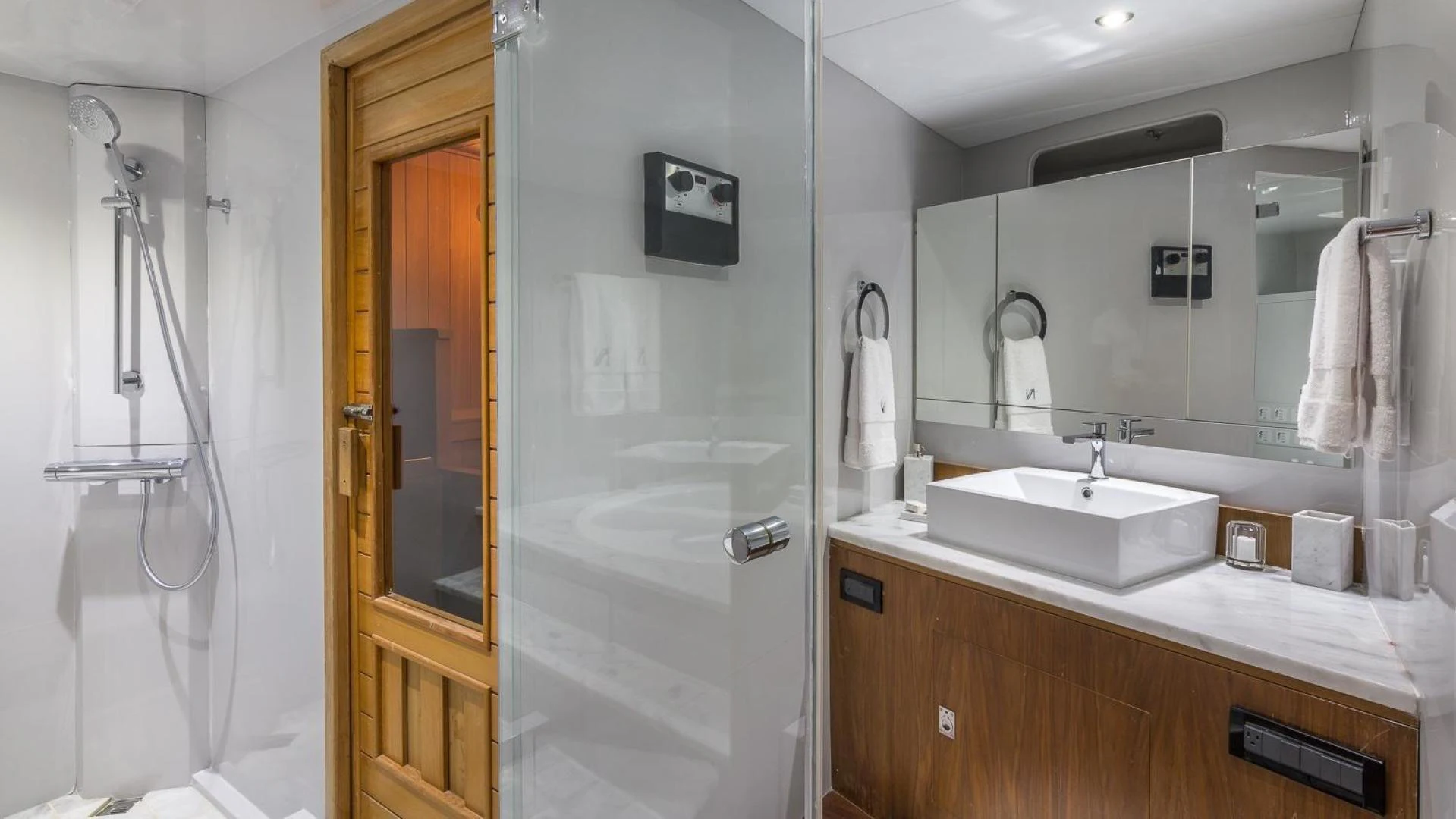 a bathroom with a sink and a mirror aboard NIRVANA Yacht for Sale